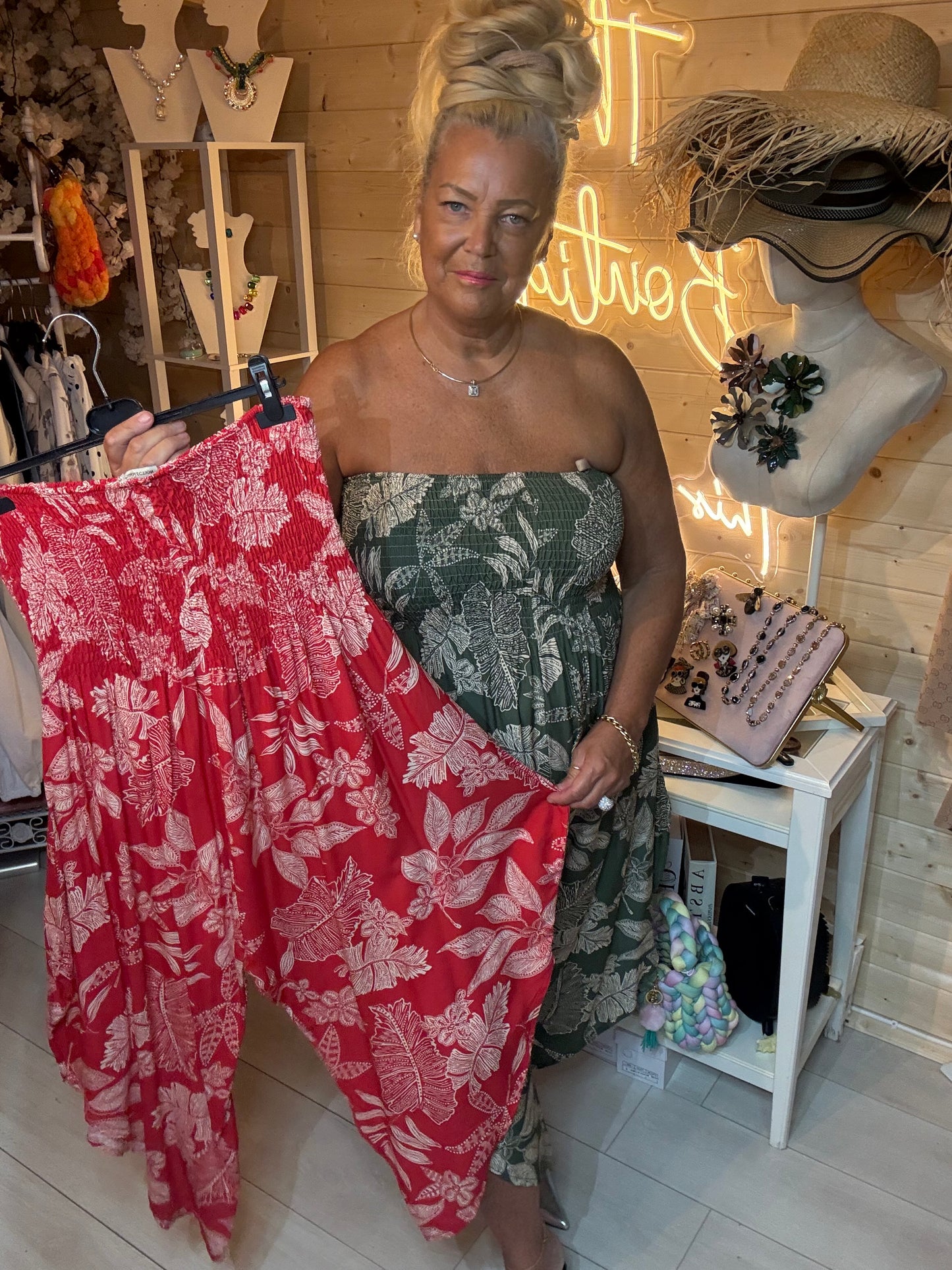 Close up of Tropez red and khaki tropical floral bandeau jumpsuit smocked bust detail