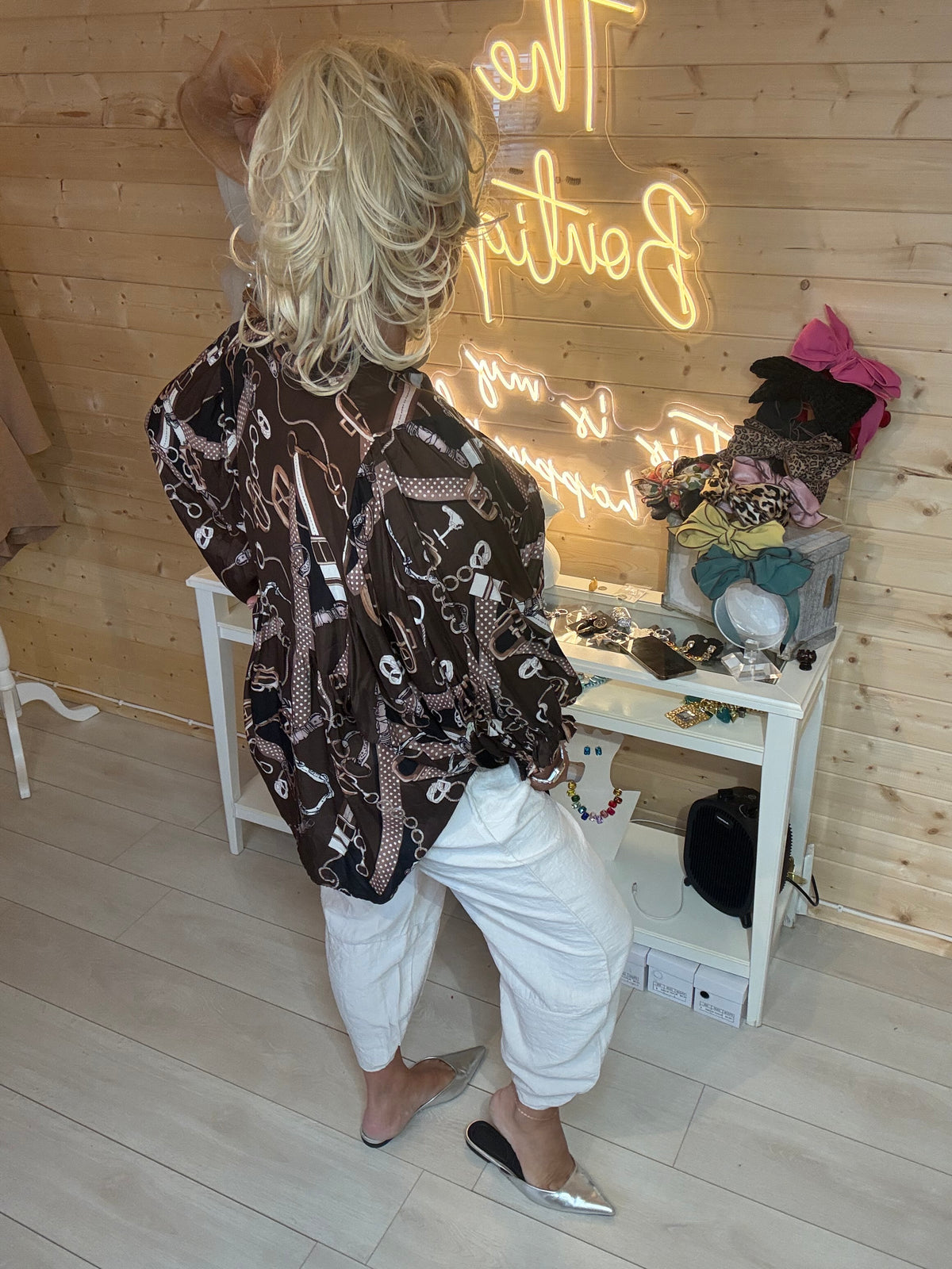 Coco oversized blouse close up showing balloon sleeve and chain print detail
