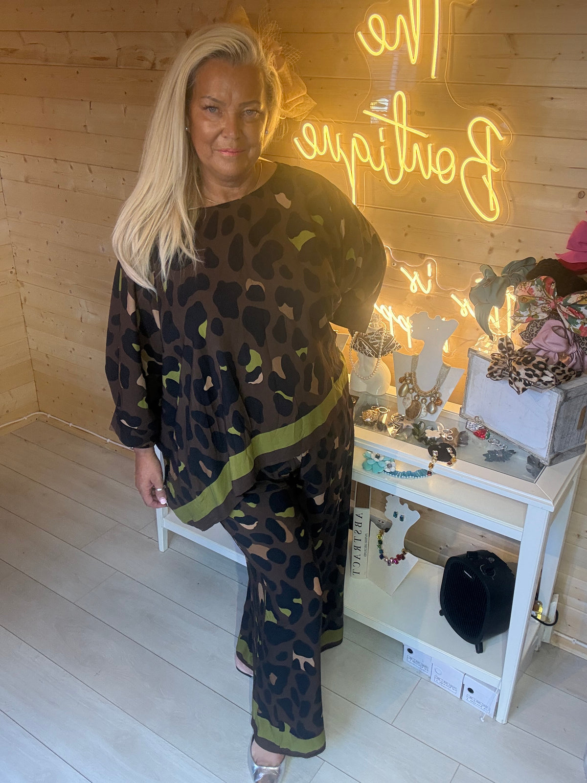 Kenya leopard print trousers in green trim colourway, full length view