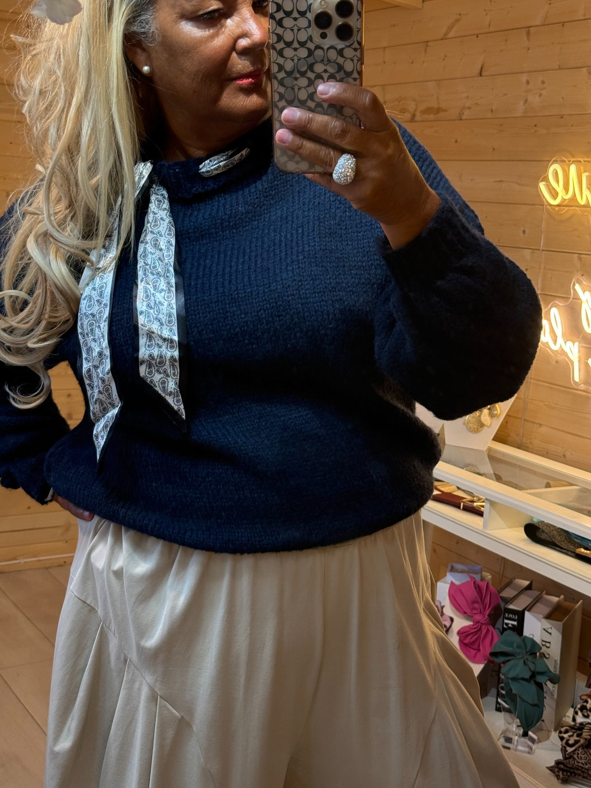 Close up of navy Arden jumper knitted fabric