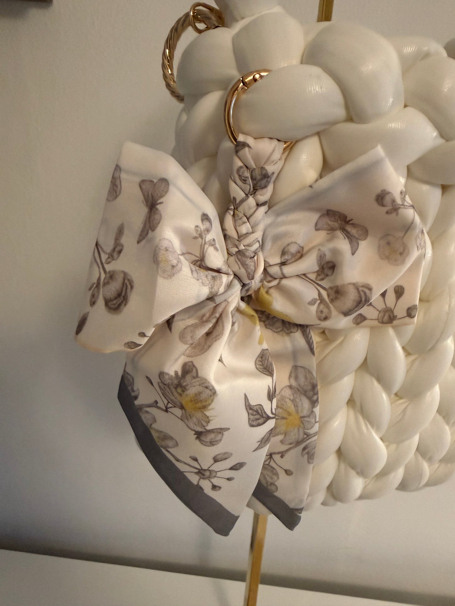 Arctic chunky braided white bag with floral bow and gold chain strap - front view