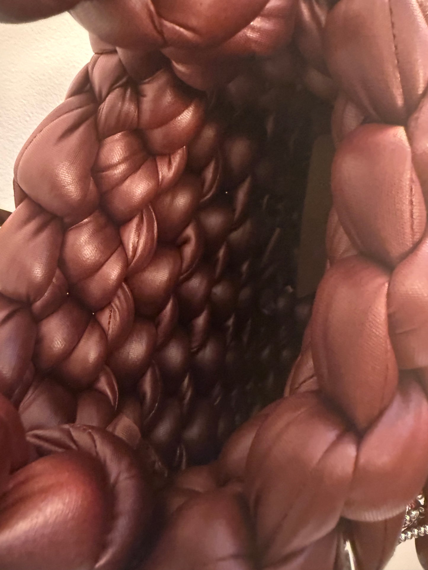 Detail shot of Bordeaux chunky braided bag showing rich burgundy braid texture and interior