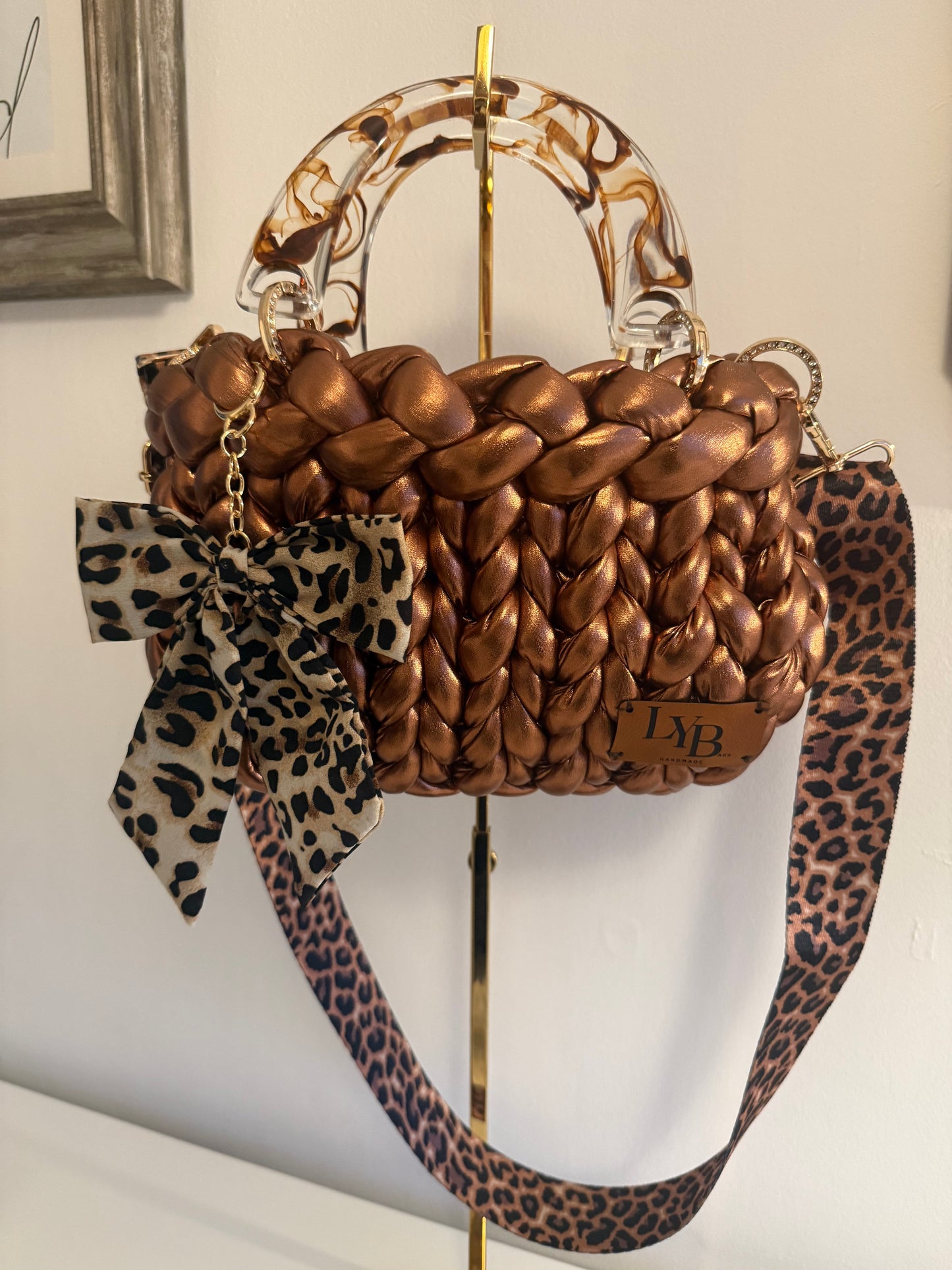 Rustica bronze chunky braid bag side view showing leopard print crossbody strap and LYB gold plate