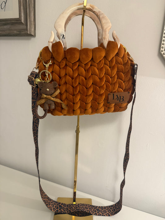 Autumn Lust burnt orange velvet chunky braid bag with marbled acrylic handle, teddy bear charm and leopard crossbody strap - front view