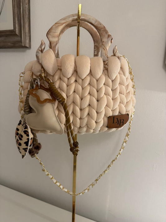Mocha cream velvet chunky braid bag with marbled acrylic handle, double heart charm cluster and pearl gold chain strap - front view