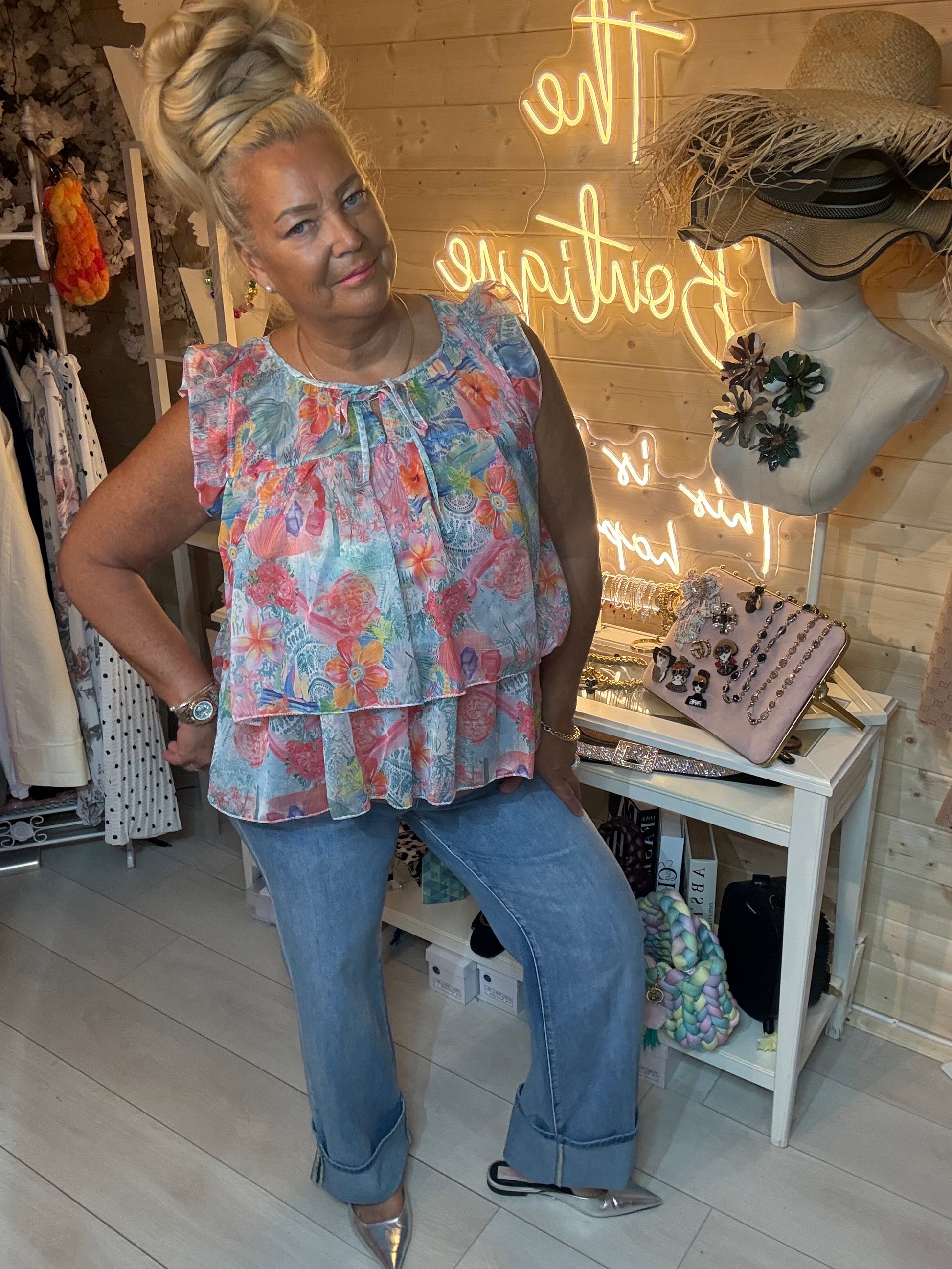 Flora women's ruffle floral top one size 8-18 styled with wide leg jeans and silver heels