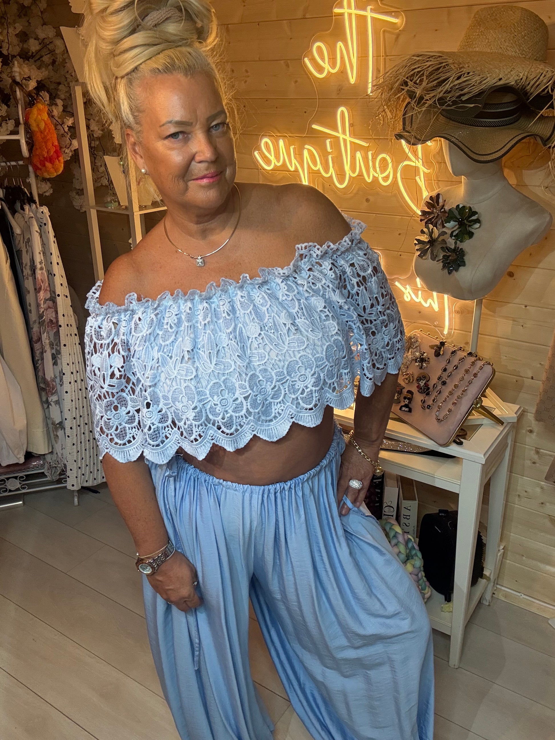 Azure lace bardot crop top – relaxed boutique pose showing neckline and lace detail
