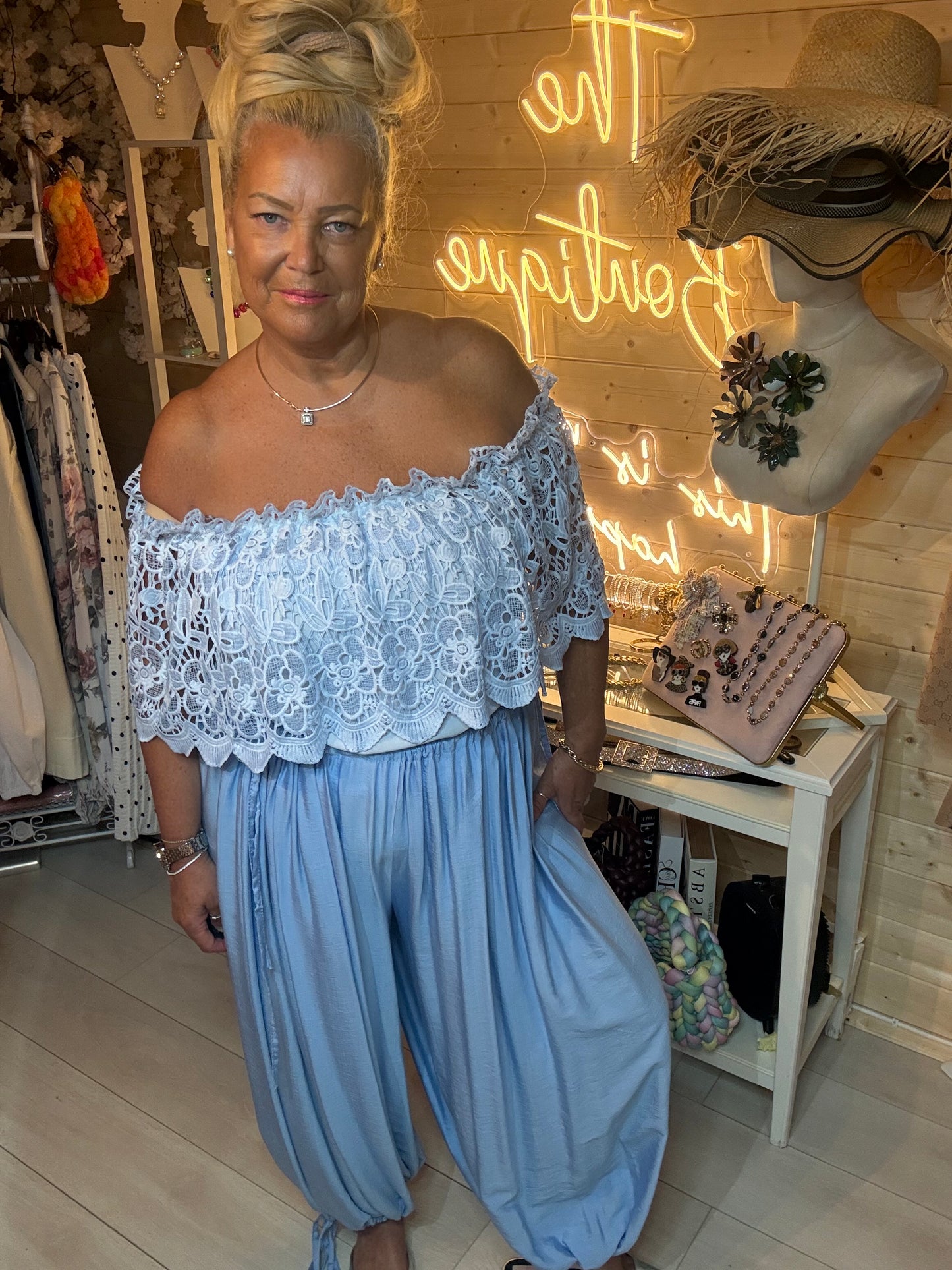 Azure women's lace bardot top one size – styled with baby blue harem trousers full outfit view