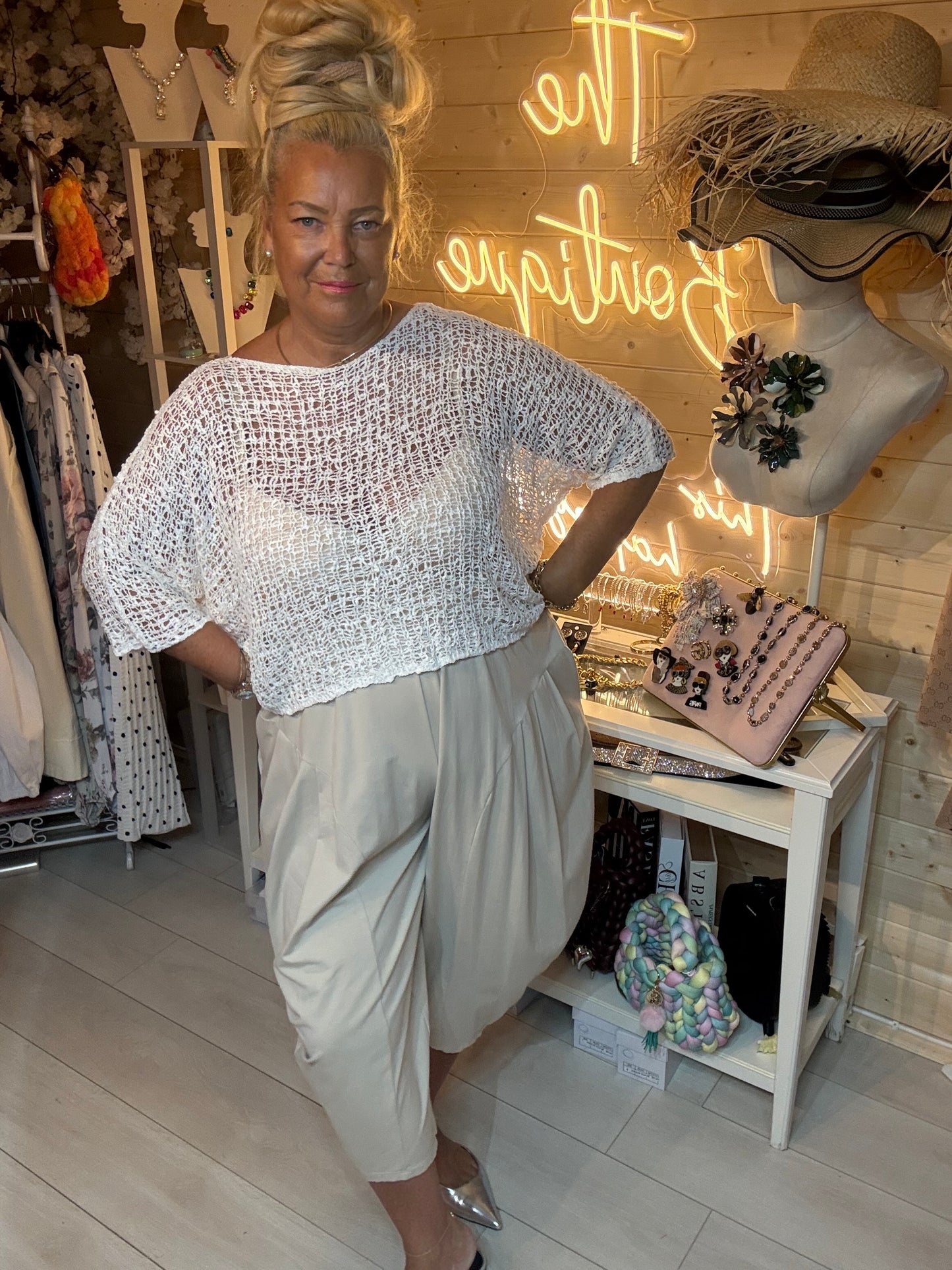 Mesh lime green open weave knit top – boutique front view showing scalloped hem and open weave texture