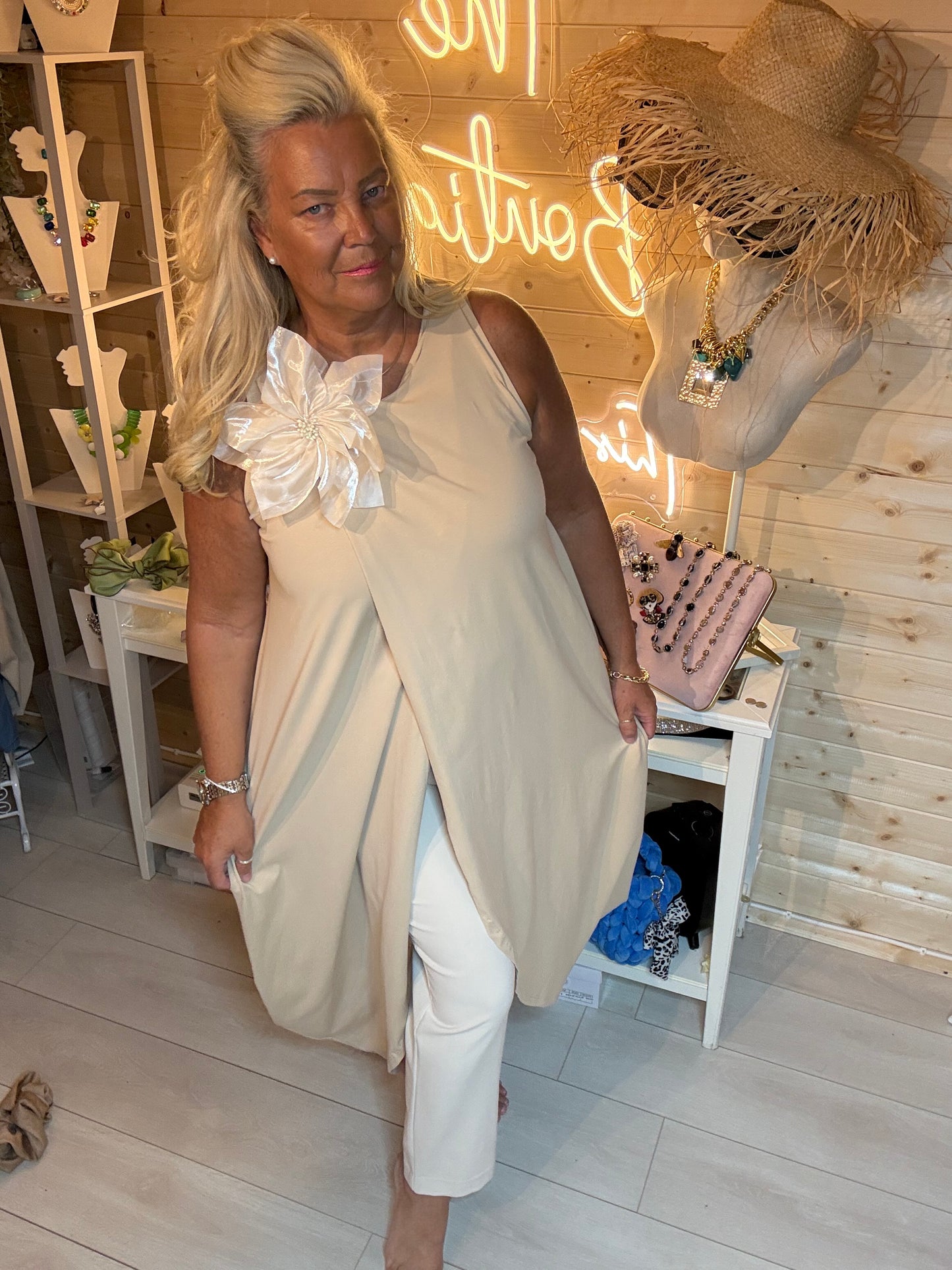 Fleur Asymmetric Wrap Slit Tunic Top with Detachable Cream Flower Corsage in Cream - full length front view - One Size 8-20 - The Ultimate Ladies Boutique