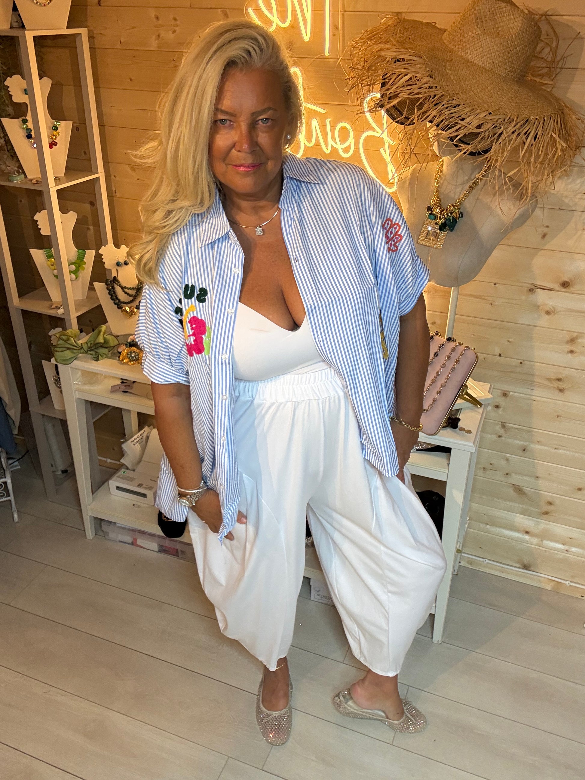 Hibiscus Summer Slogan Stripe Shirt worn open - full length front view styled with white harem trousers and diamante ballet flats - One Size 8-20 - The Ultimate Ladies Boutique