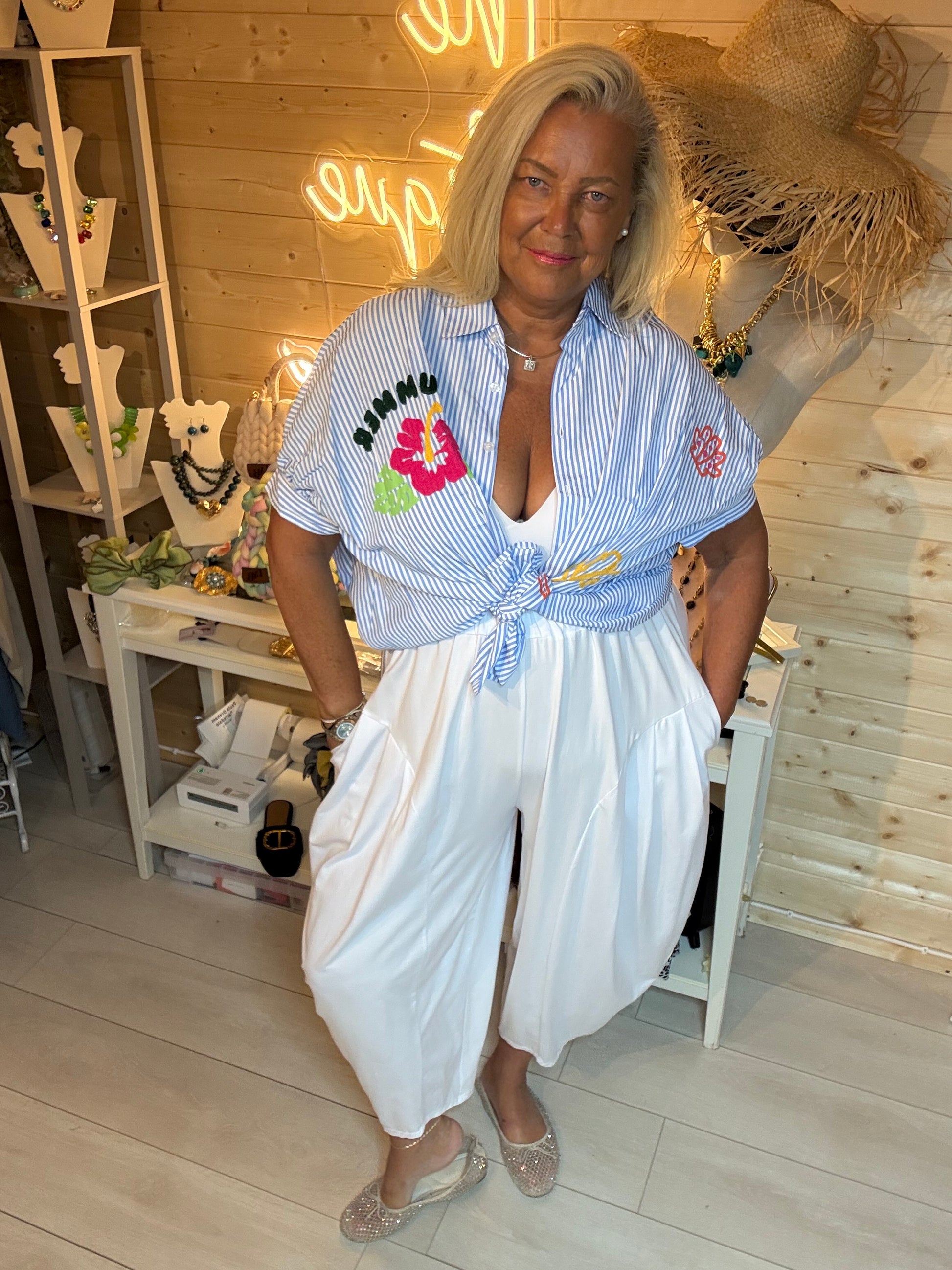 Hibiscus Summer Slogan Stripe Shirt tied at waist - full length front view showing versatile styling - One Size 8-20 - The Ultimate Ladies Boutique