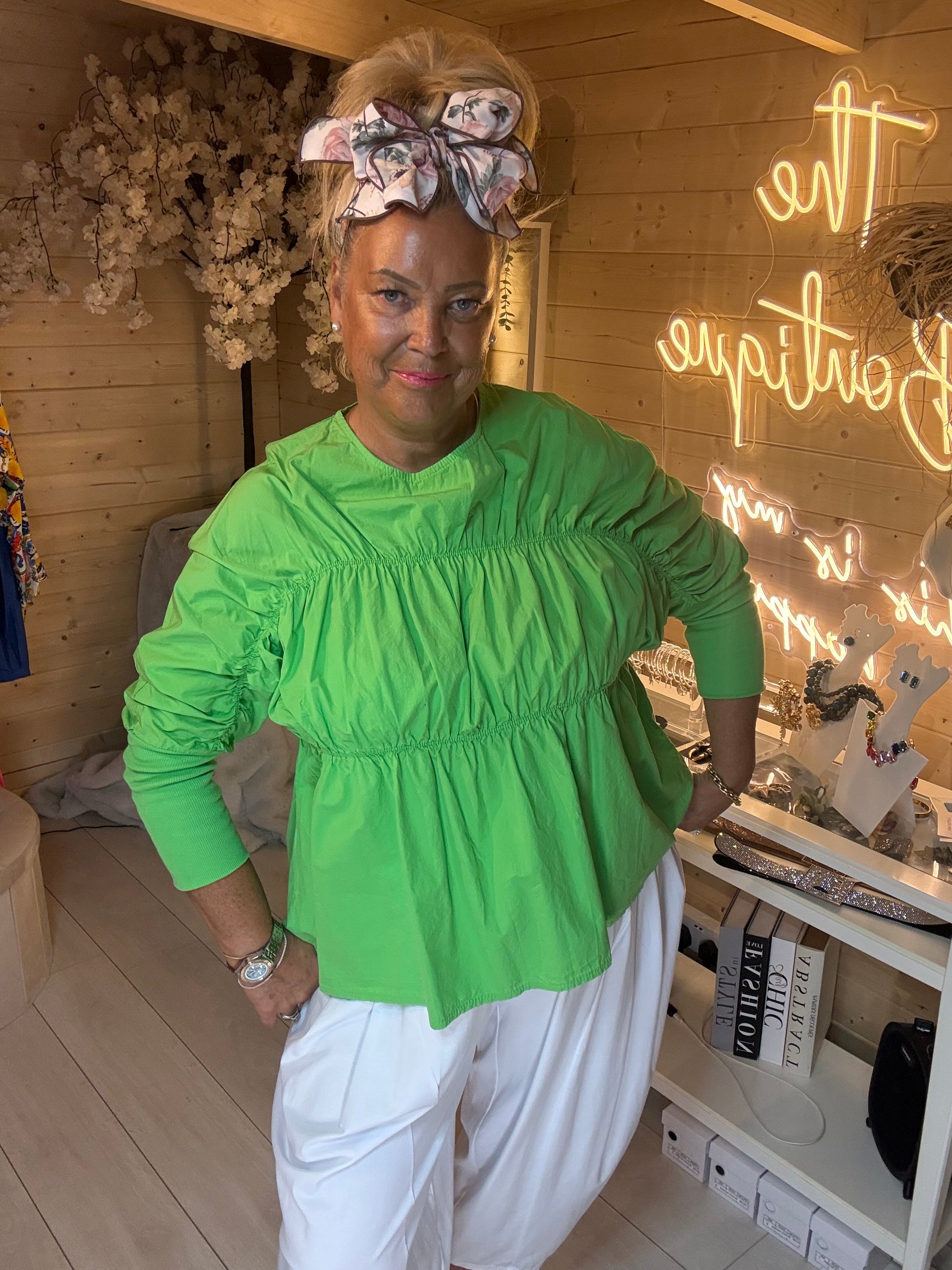 Lola ruched peplum top close-up bodice detail – lime green stretchy top