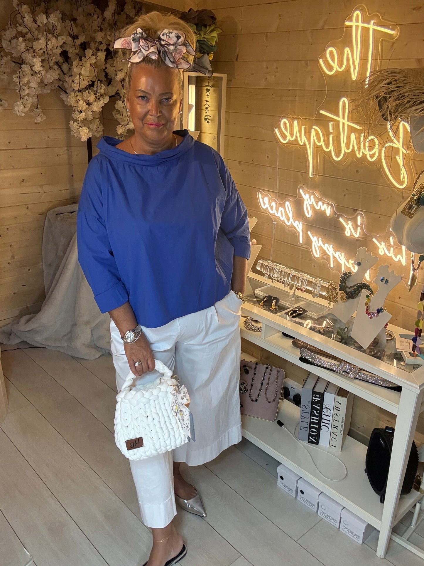 Nova cobalt blue top styled with white bag and culottes – The Ultimate Ladies Boutique
