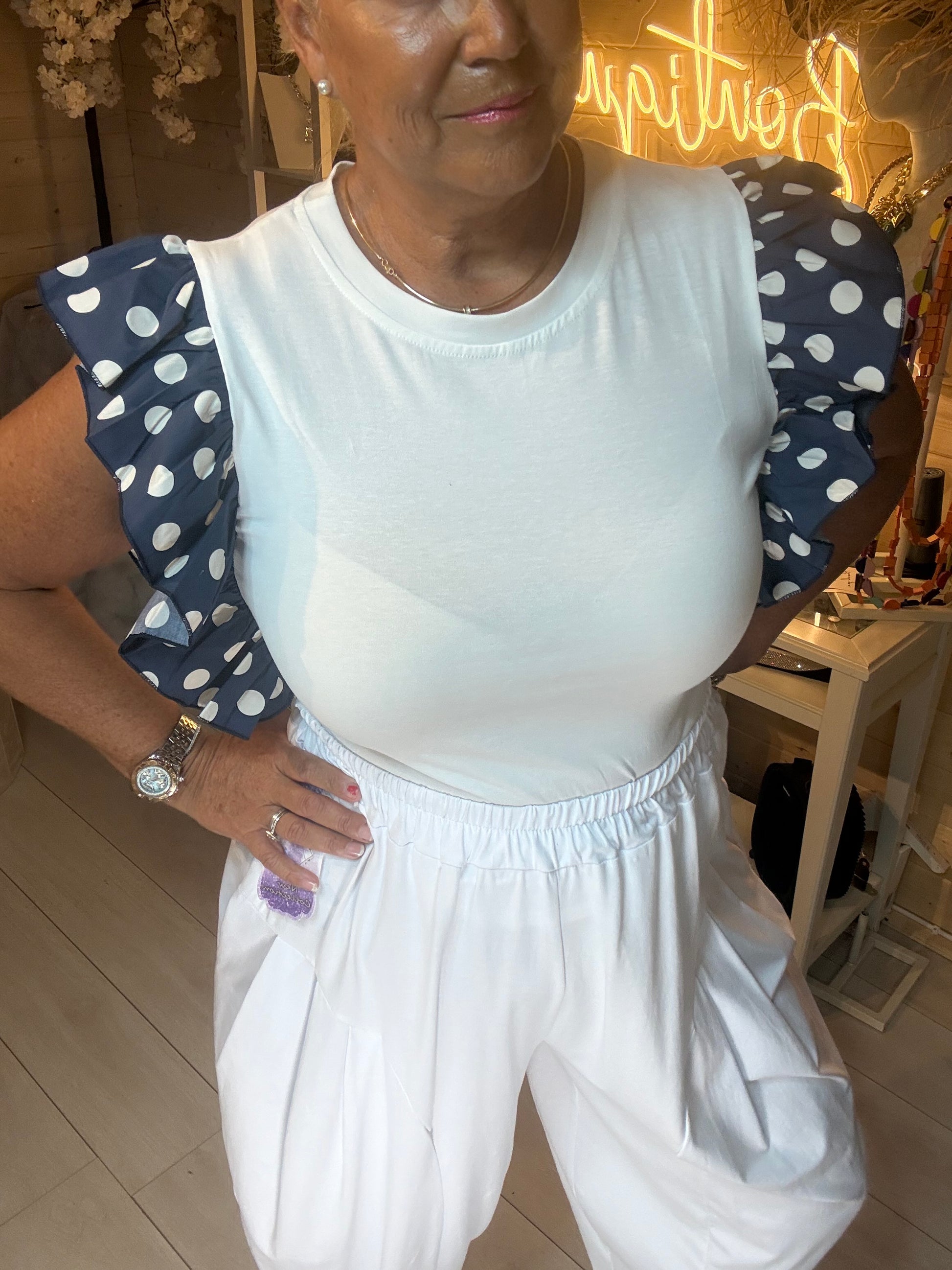 Dotty polka dot frill sleeve top close-up bodice detail – boutique statement top