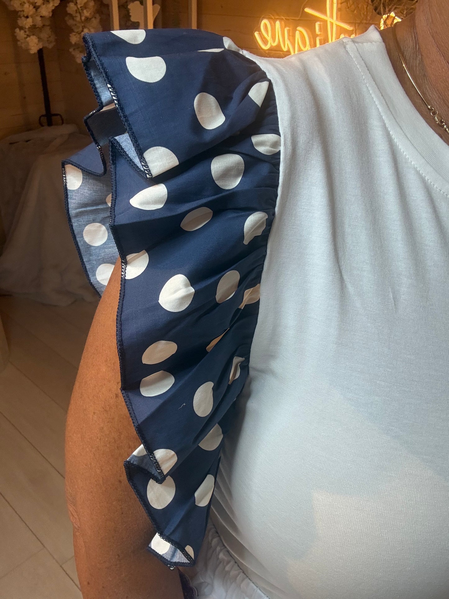 Dotty navy polka dot ruffle sleeve close-up detail – The Ultimate Ladies Boutique