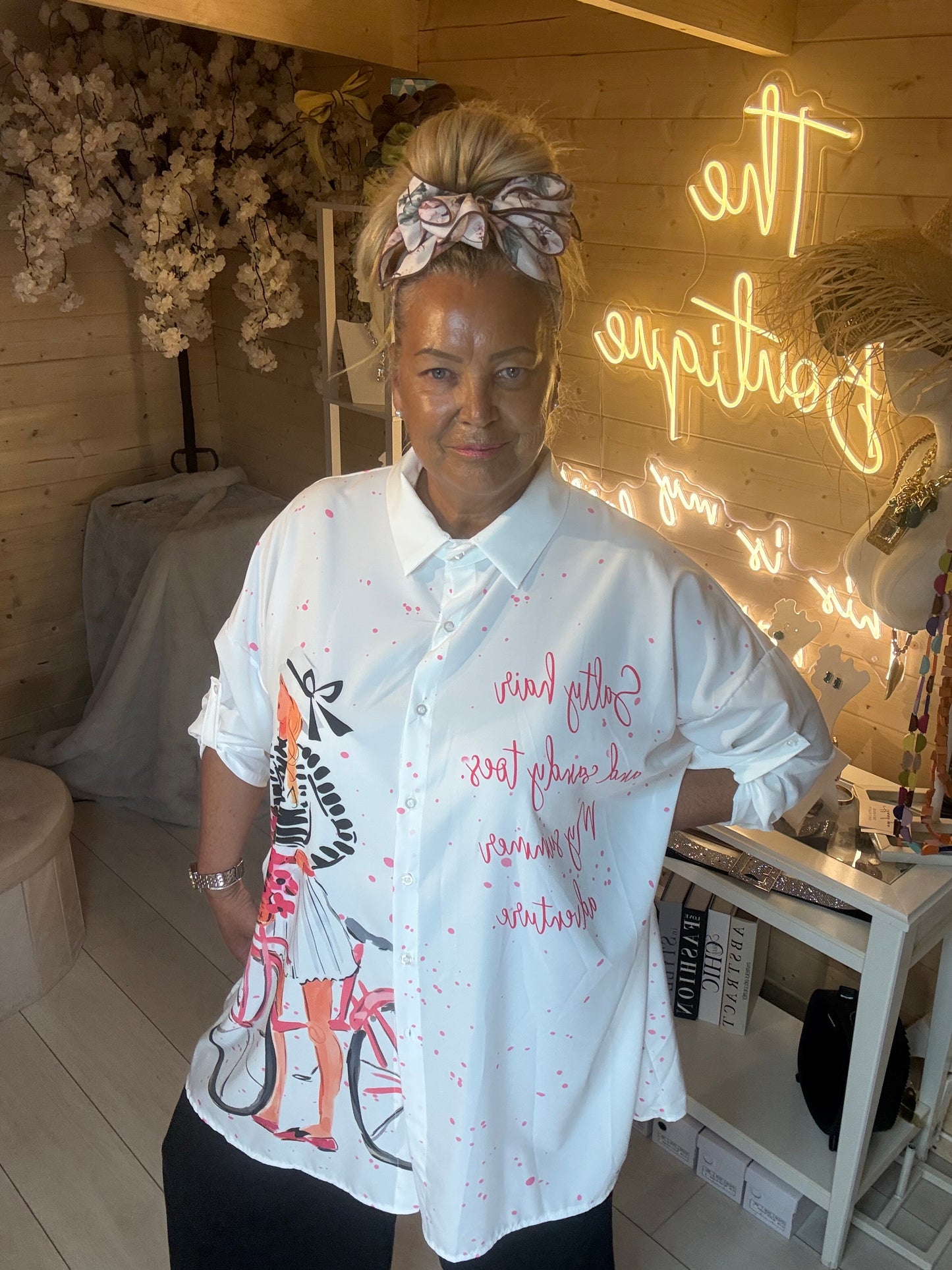 Colette white oversized shirt with Parisian bicycle print – front close-up view on model