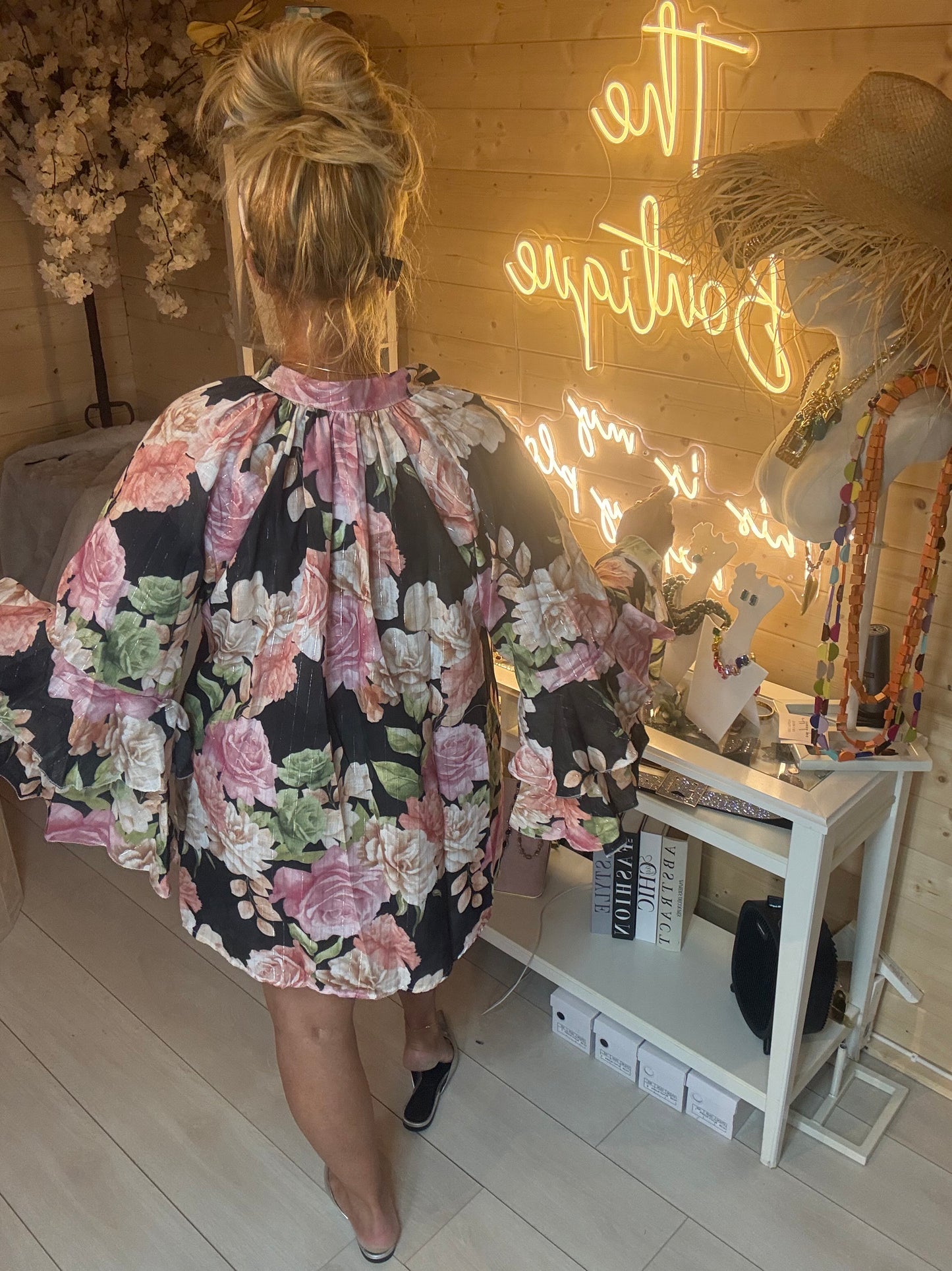 Valentina black floral ruffle sleeve blouse one size 8-18 – back view showing dramatic bell sleeves on model