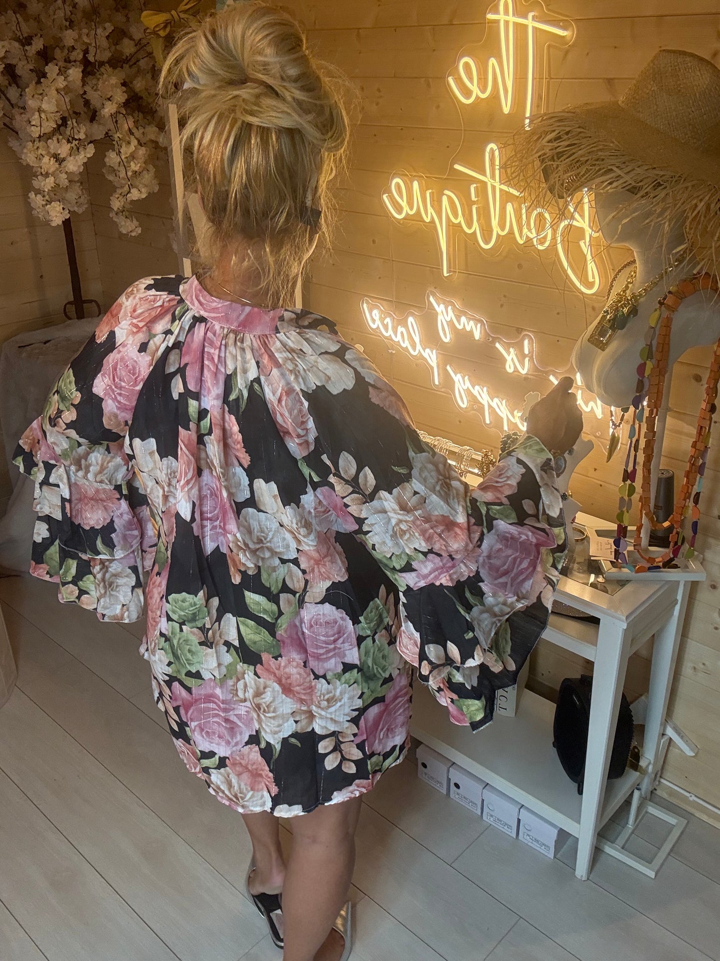 Valentina black rose print blouse back view with tiered ruffle sleeves – boutique occasion blouse