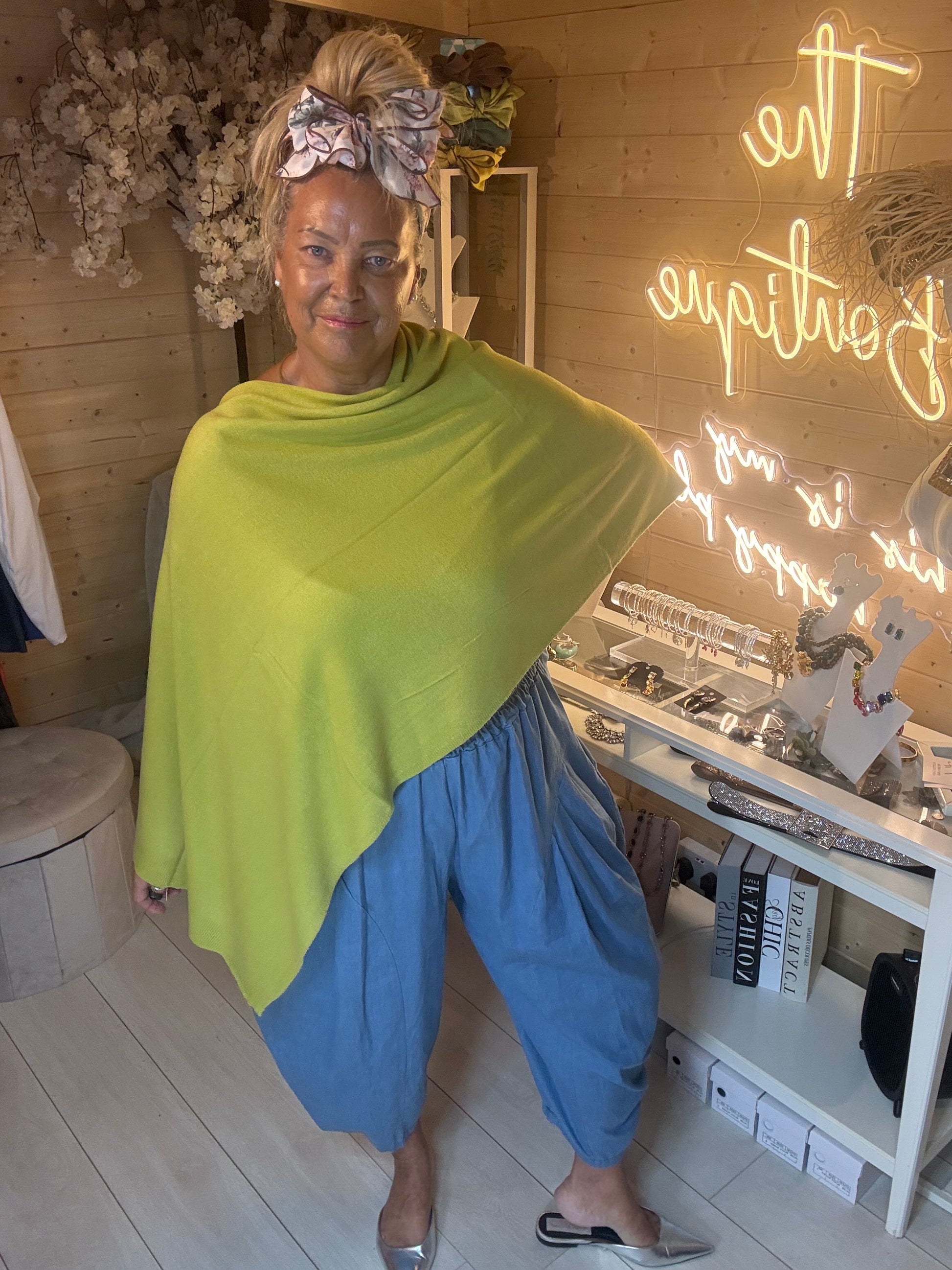 Brezza cobalt blue knit poncho cape full length view showing asymmetric drape – one size 8-20