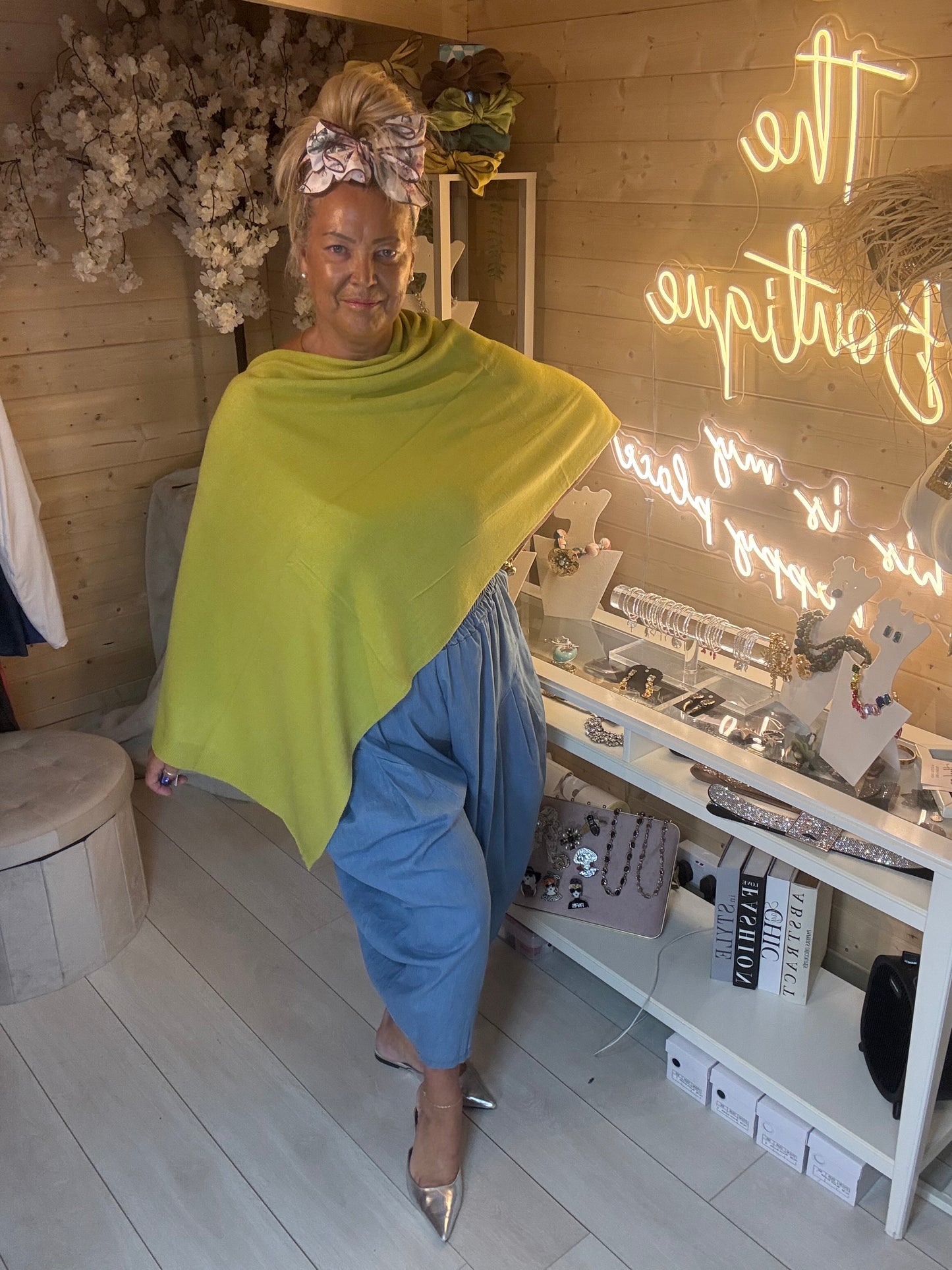 Brezza cobalt blue lightweight knit poncho cape full length front view on model