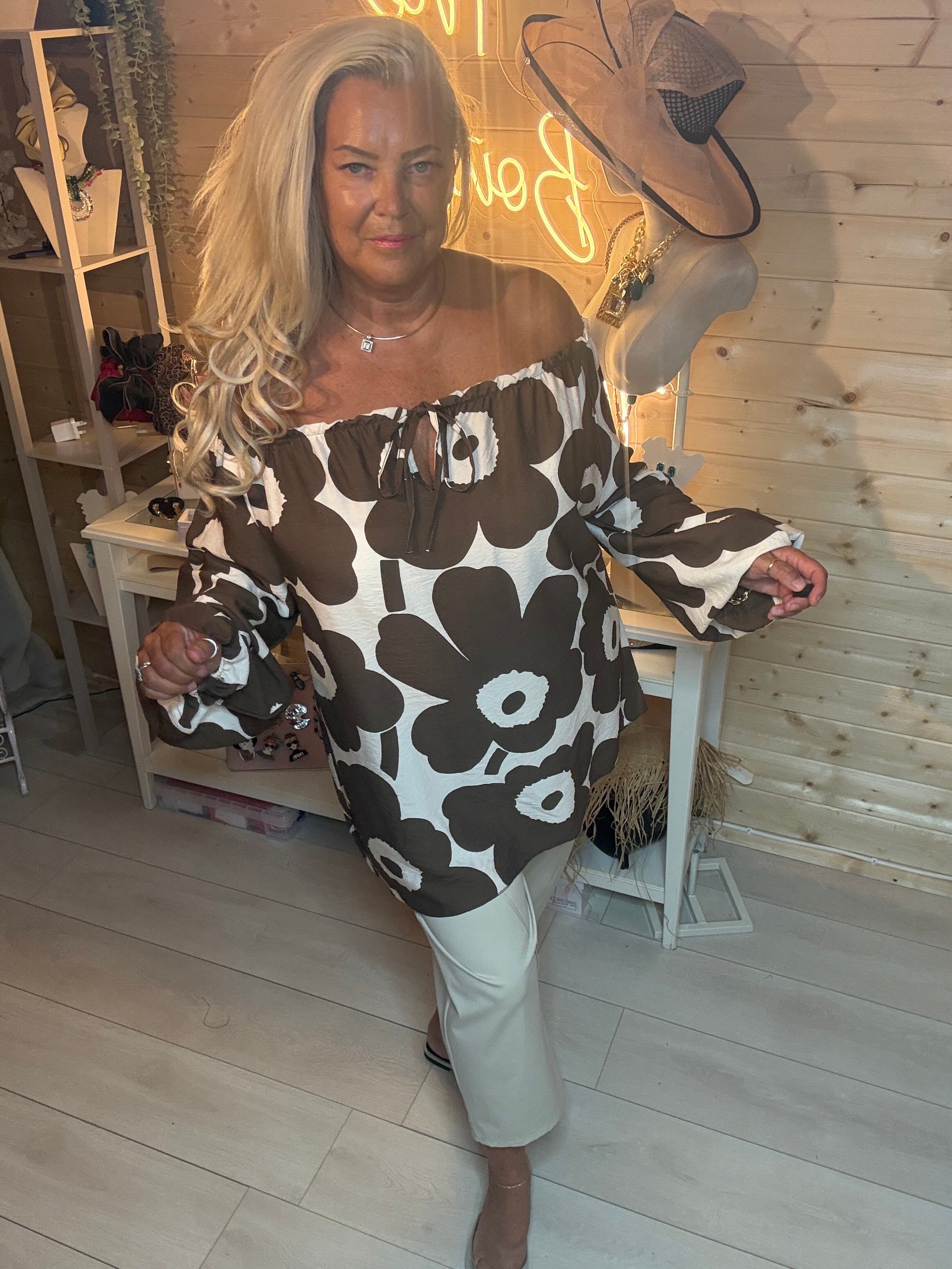 Brown floral bardot top – full length view showing floaty fit and tie neckline detail