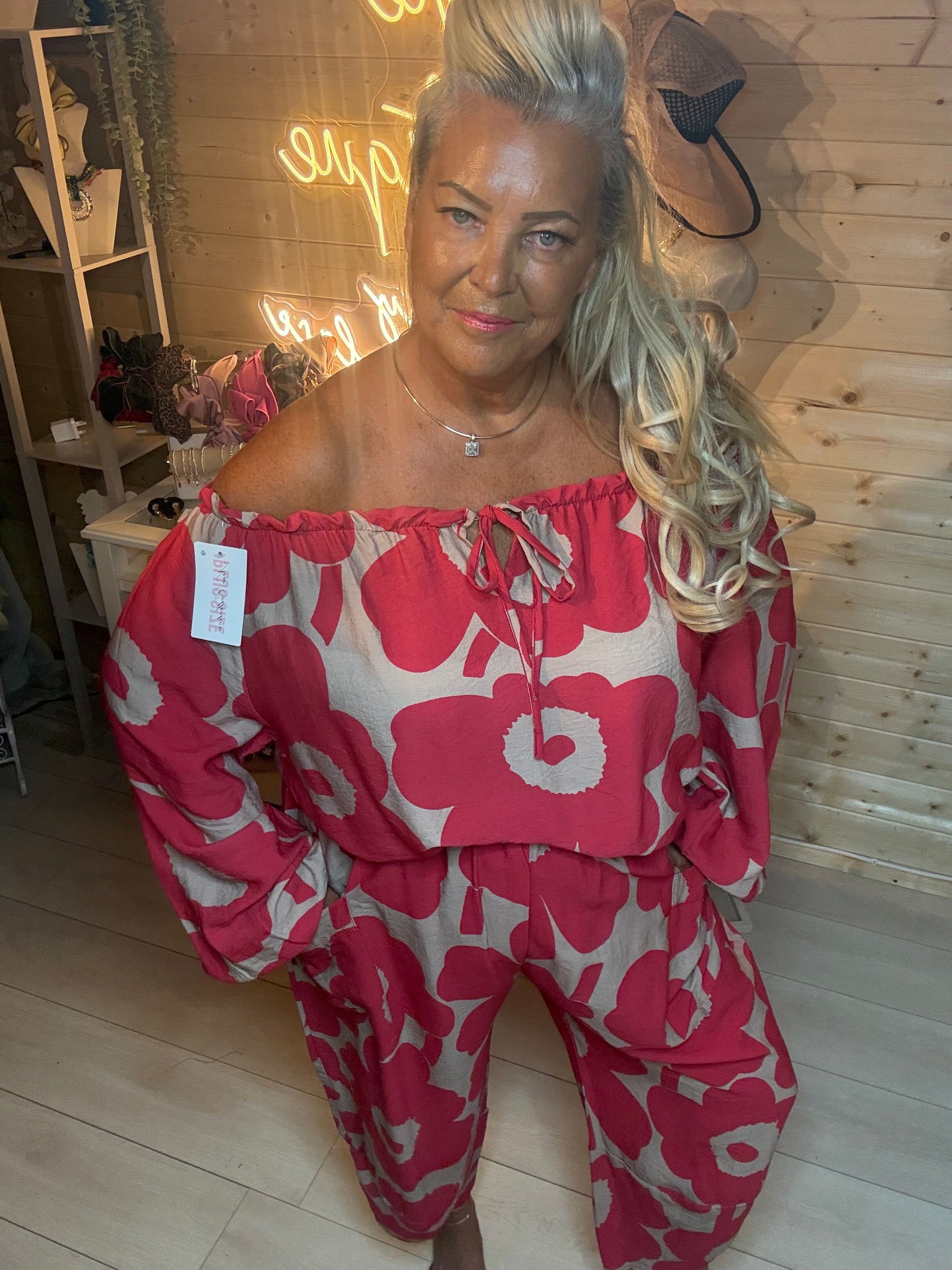 Red bold floral slouch trousers – relaxed full length pose