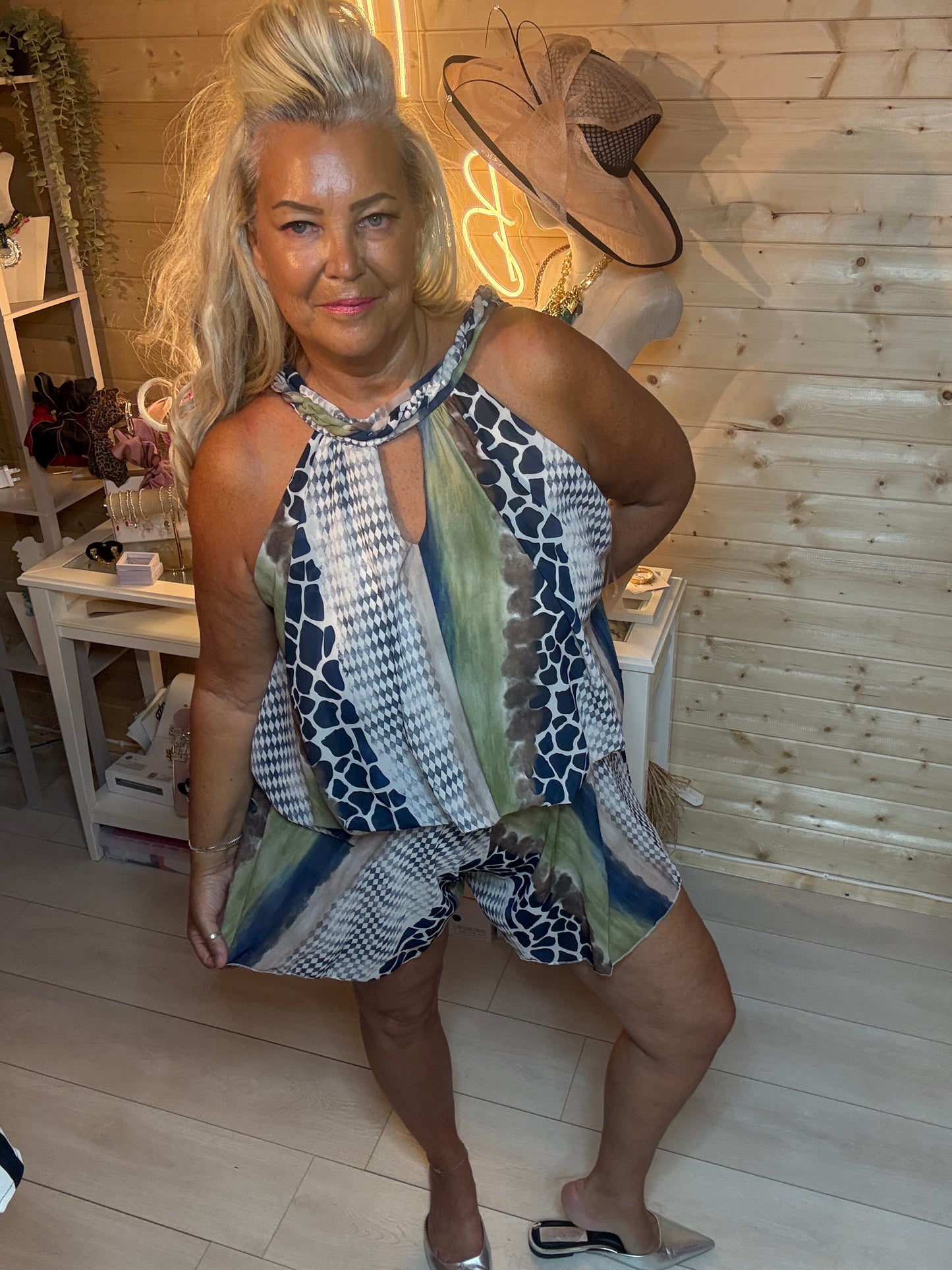 Mixed print halterneck playsuit – full length front view showing keyhole detail, floaty peplum top and relaxed shorts