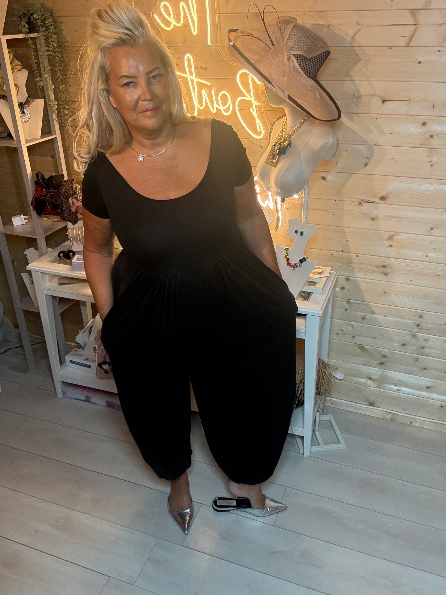 Brown chocolate harem pocket jumpsuit – full length front view showing scoop neck and relaxed harem silhouette