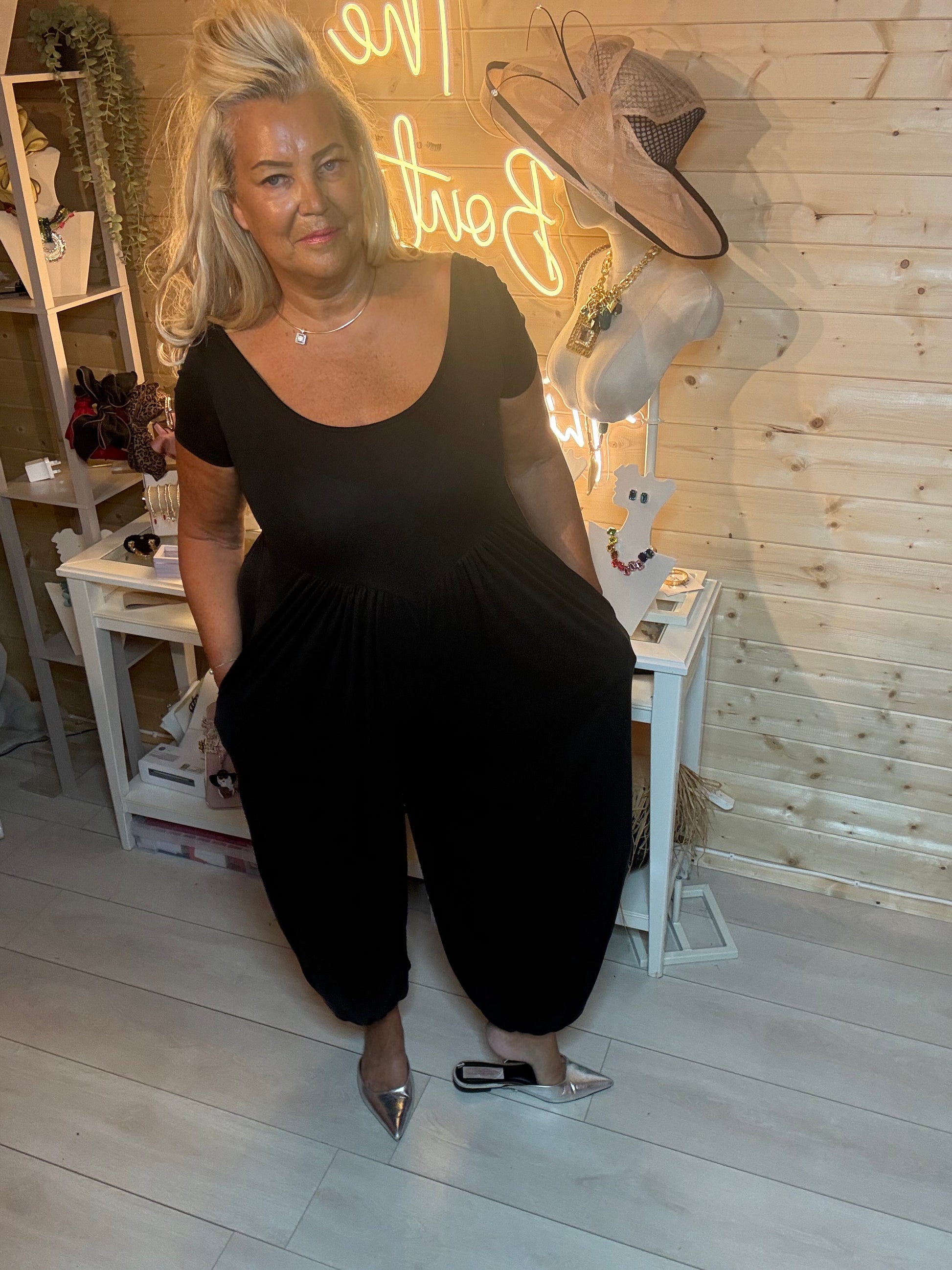Brown chocolate harem pocket jumpsuit – full length front view showing scoop neck and relaxed harem silhouette