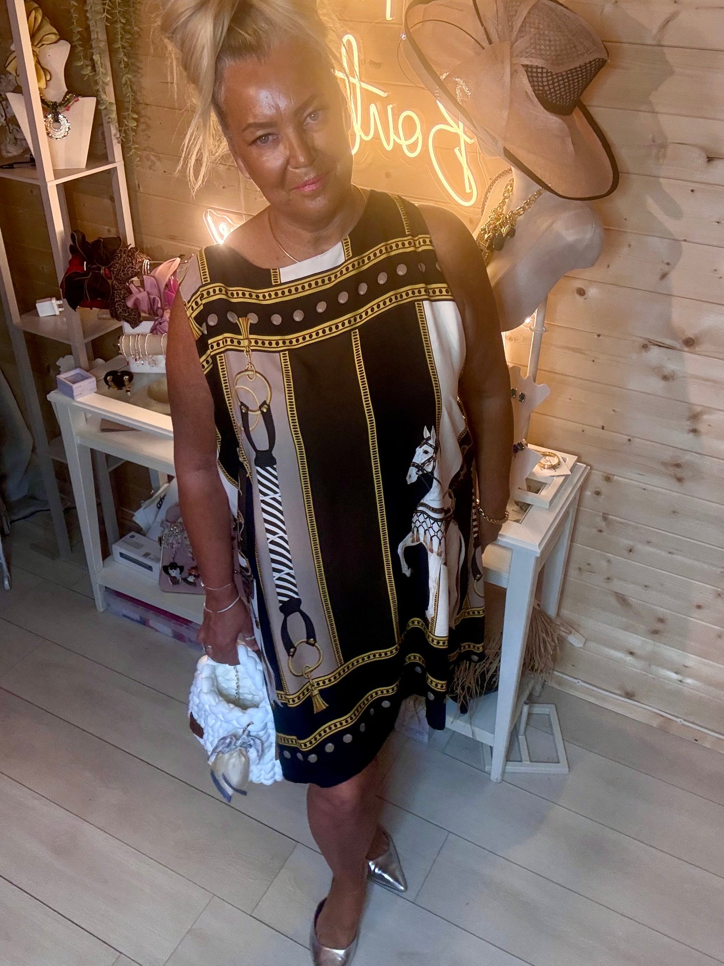 Brown equestrian scarf print shift dress – full length front view showing horse, chain and tassel print in brown, black, cream and gold colourway