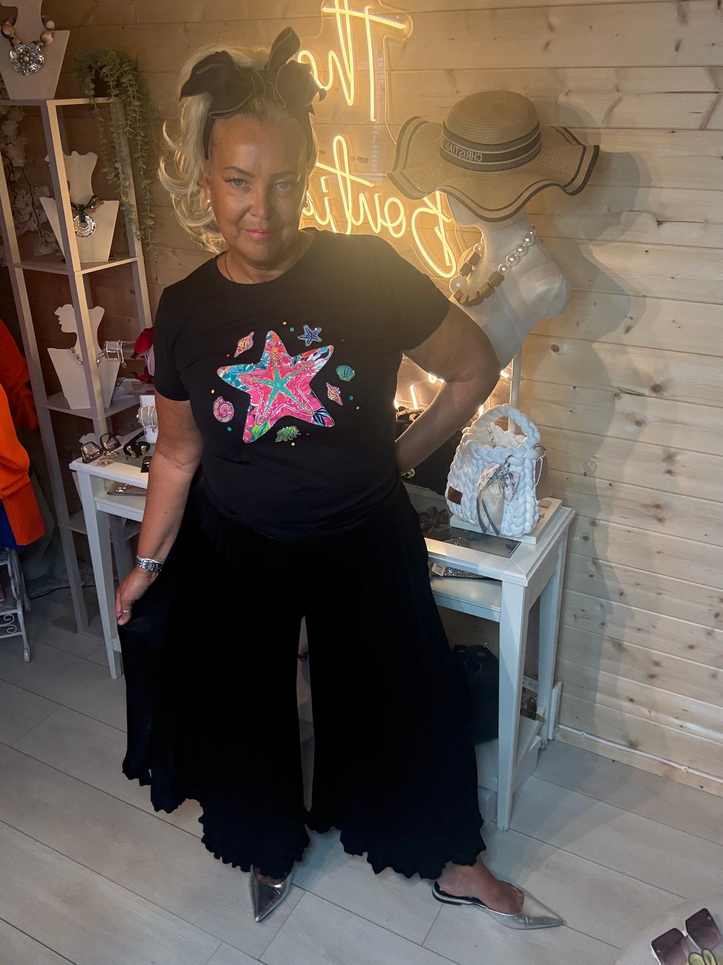 Marina starfish print T-shirt in black styled with ruffle trousers – one size 8-18 – The Ultimate Ladies Boutique