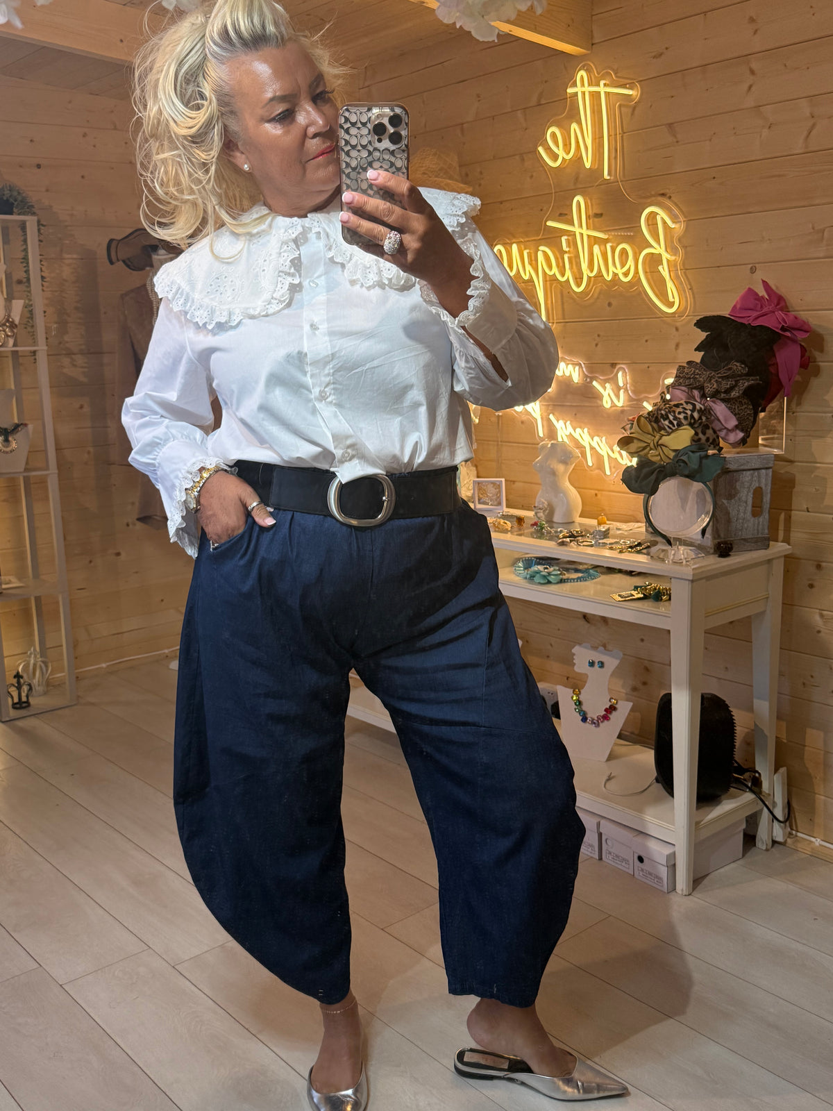 Versailles white lace collar blouse styled with navy trousers at The Ultimate Ladies Boutique