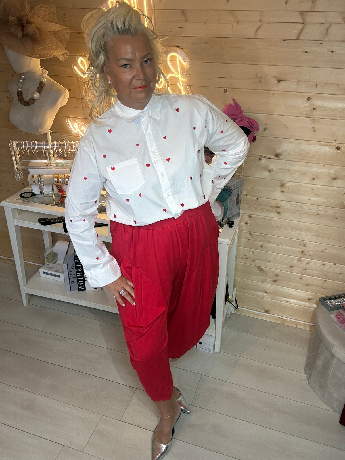 Cuore white heart print oversized shirt close up showing red embroidered hearts and collar detail