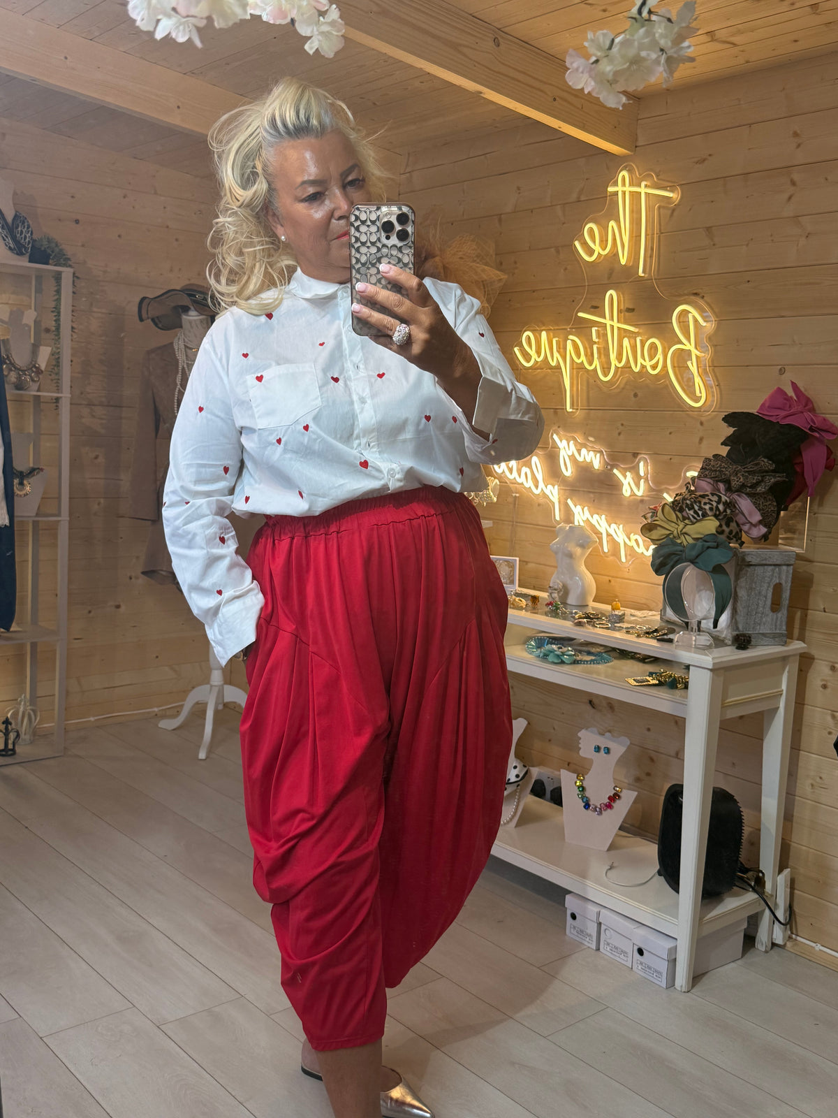 Cuore white heart embroidered shirt with red trousers boutique styling shot
