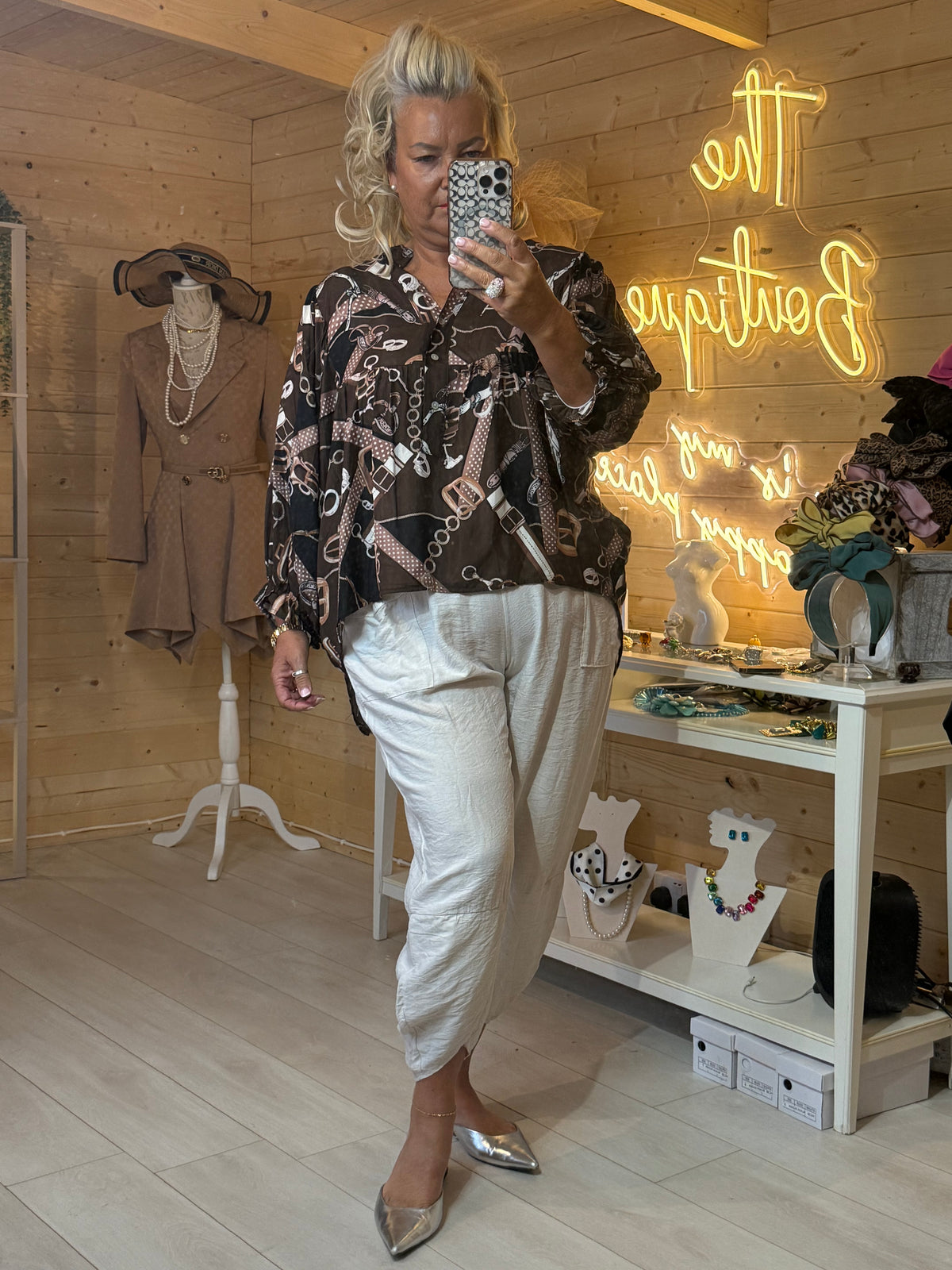 Coco chocolate brown equestrian print blouse full length outfit with cream trousers and silver mules