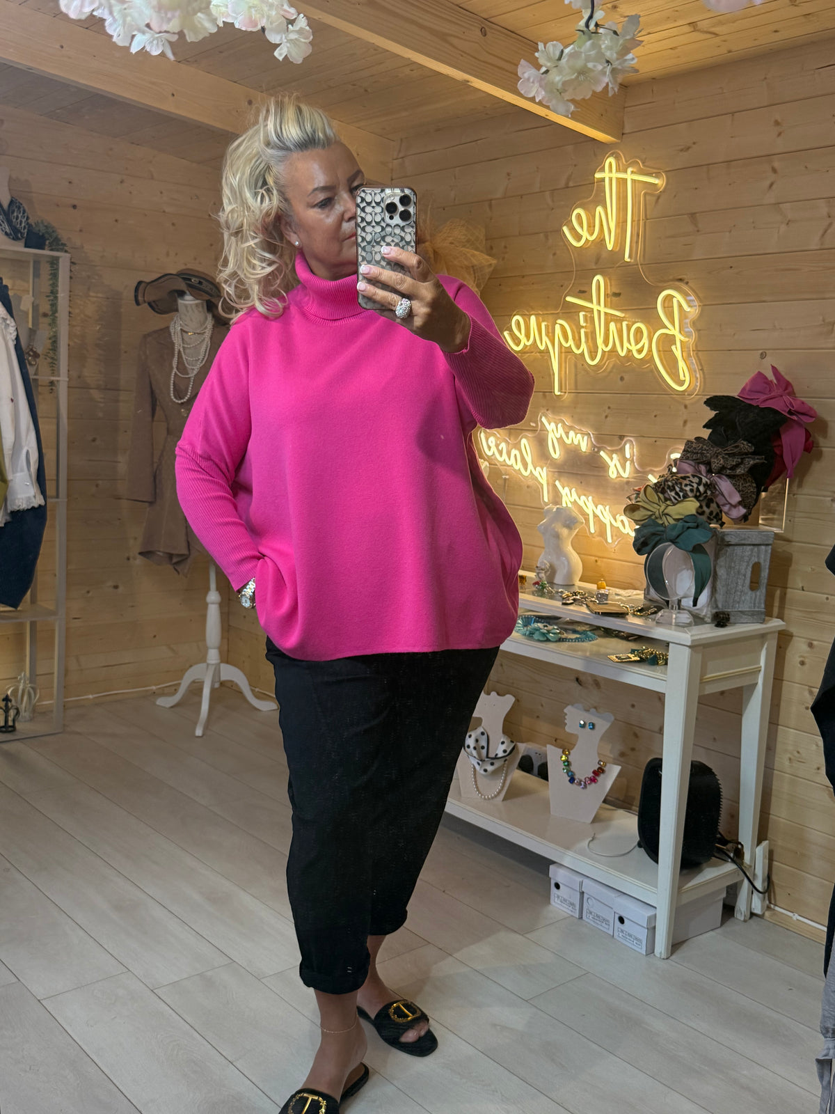 Pola cobalt blue oversized roll neck jumper three quarter length view showing side split hem