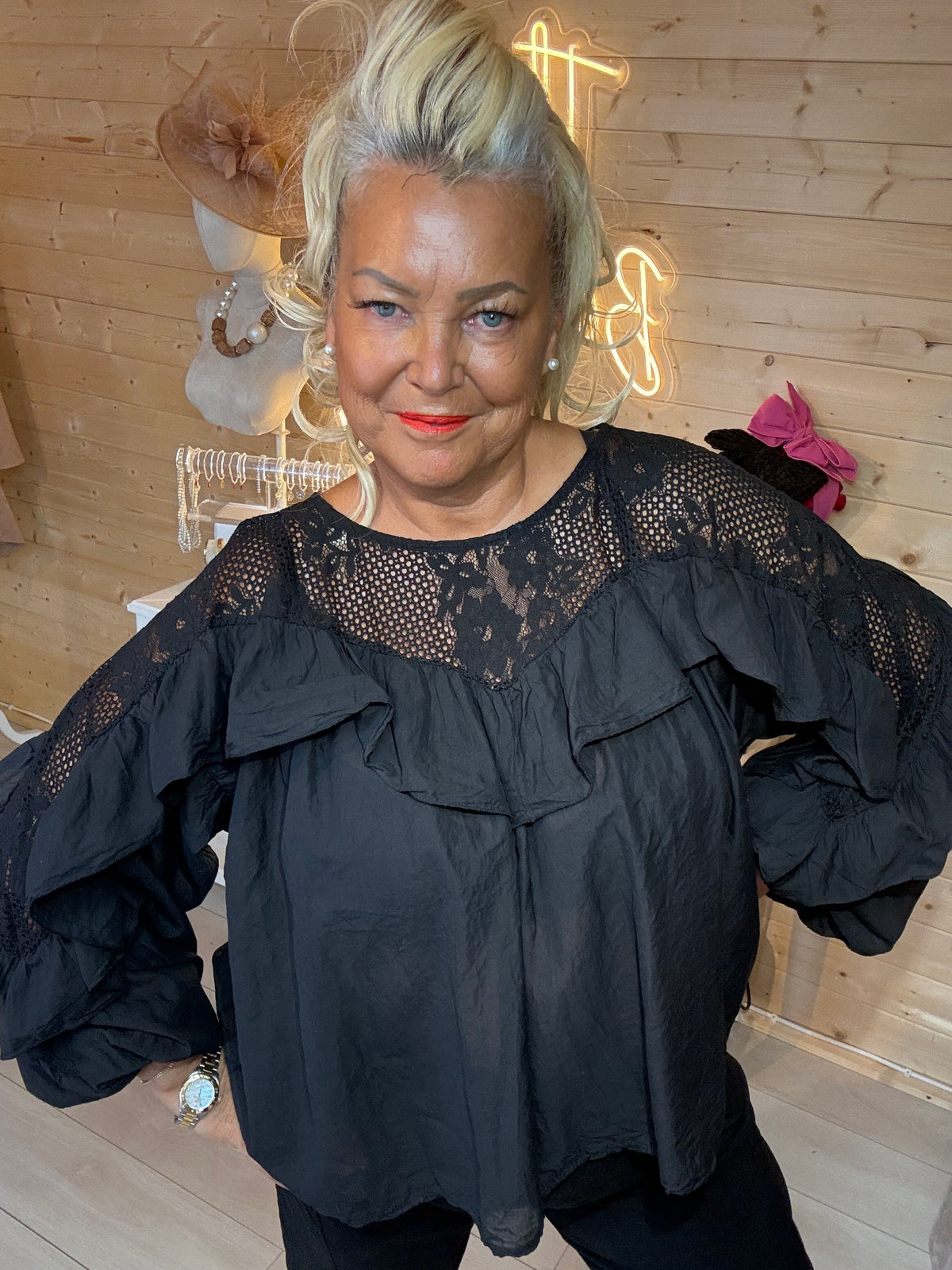 Lola black lace blouse full length mirror selfie with black magic trousers and gold buckle slides side pose