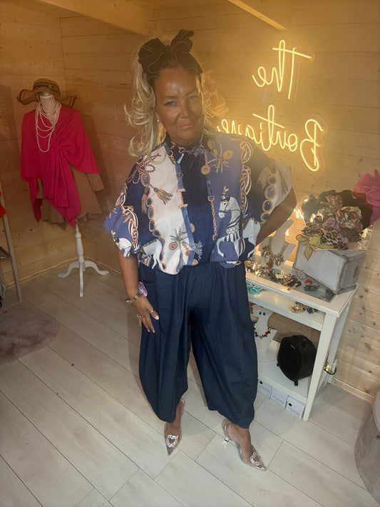Lucia equestrian print shirt styled with navy wide-leg trousers, one size 8-18