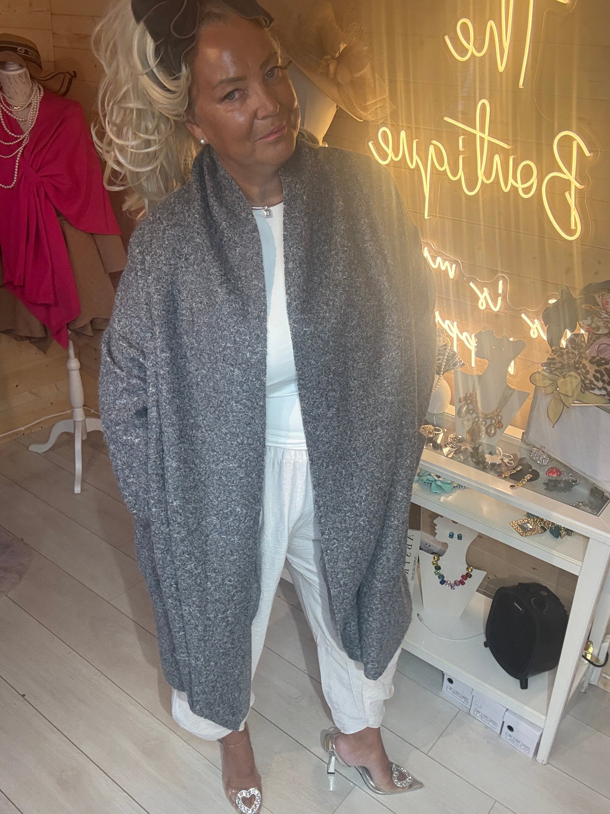 Cascade oversized coat in electric blue, smiling pose, one size 8-22
