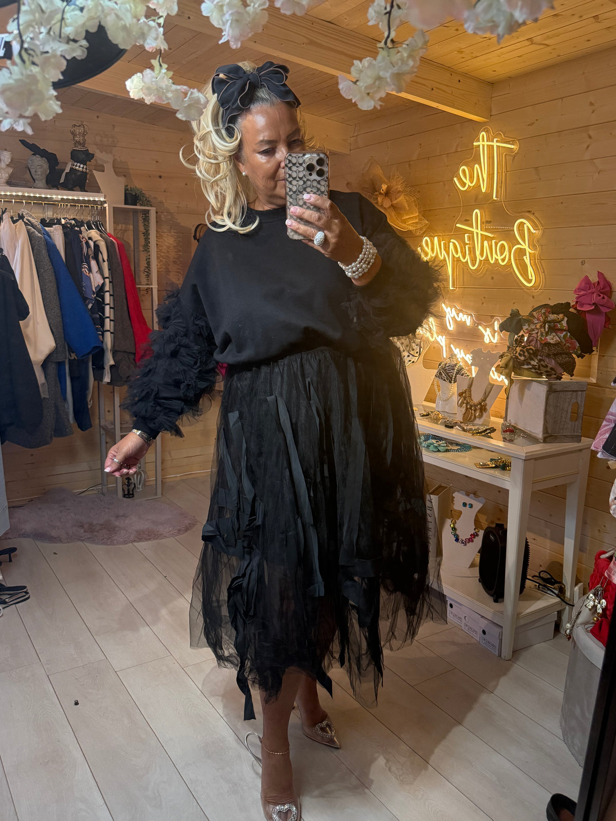 Raven black ruffle sleeve jumper, close-up of ruffle detail, one size 8-18
