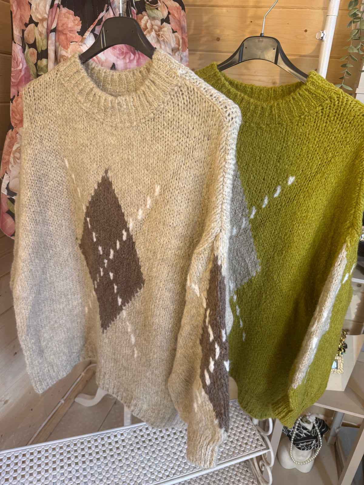 Lucca diamond knit jumpers in Beige and Apple Green on hangers