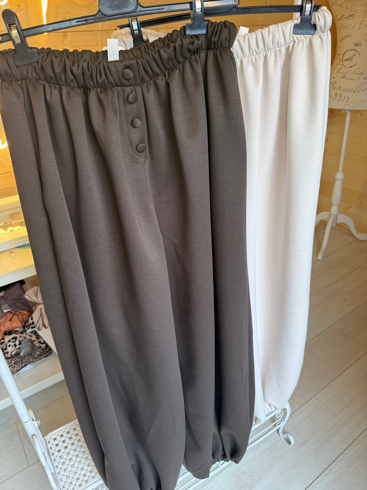 Lodi balloon trousers in Brown and Cream displayed together