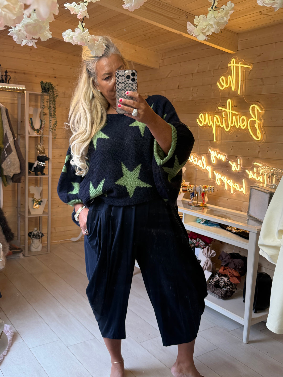 Front outfit view of Vega star knit jumper showing its relaxed drape