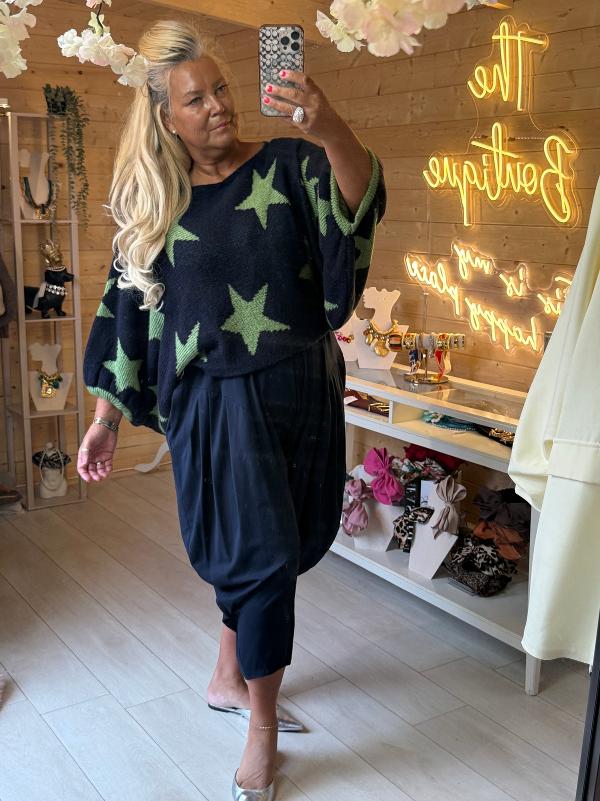 Vega navy jumper with green stars worn with Plain Slouch Trousers, sold separately