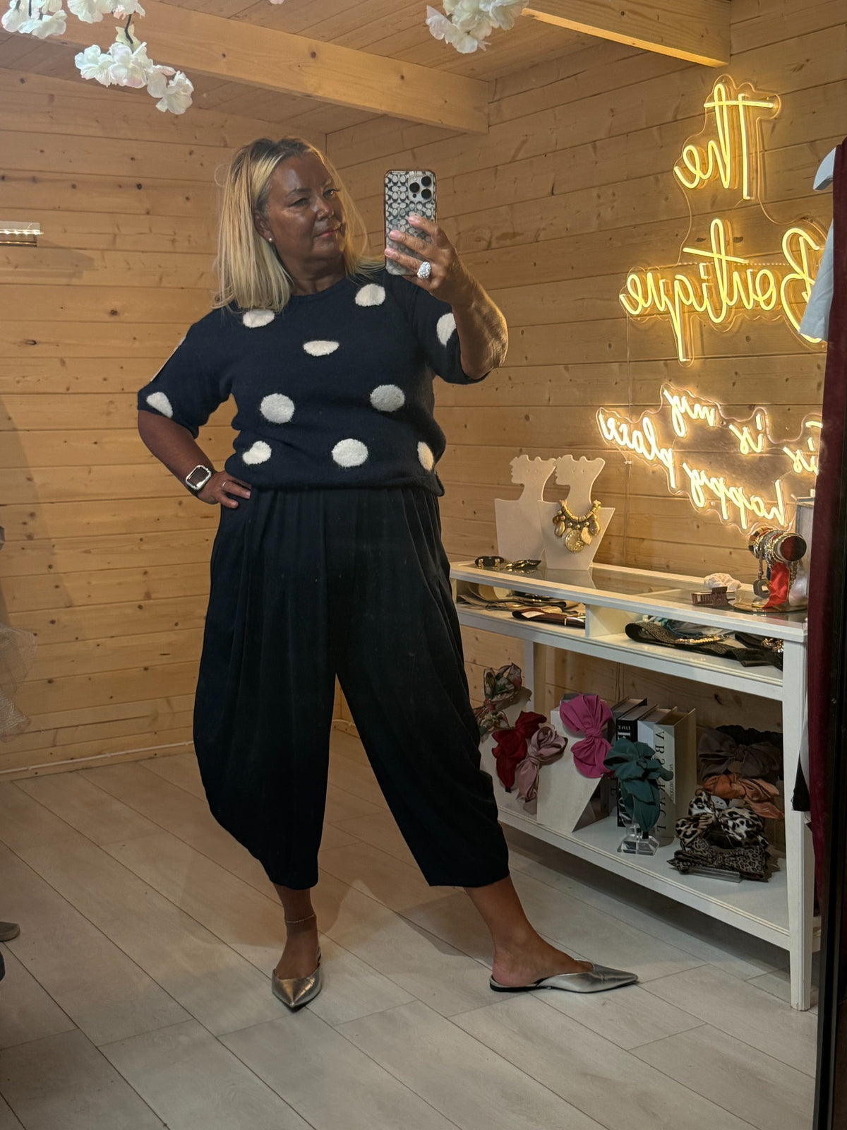 Full outfit view of navy Darcy polka dot jumper