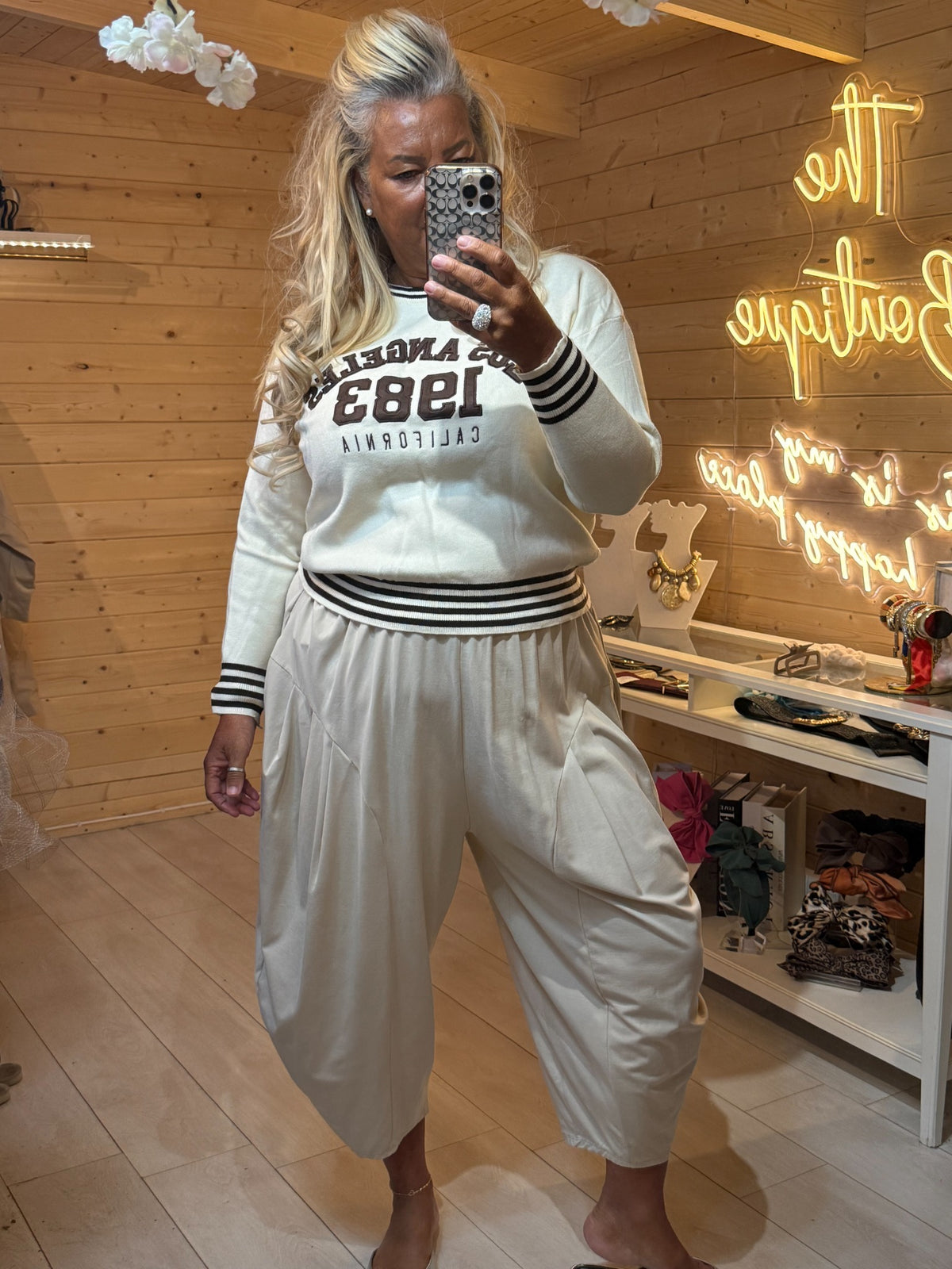 Monroe cream varsity slogan jumper with black striped cuffs and waistband