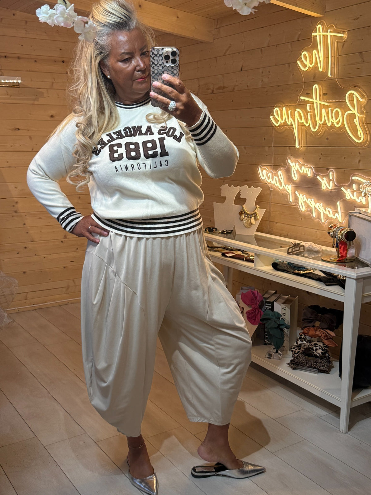 Cream Monroe jumper shown with matching cream slouch trousers