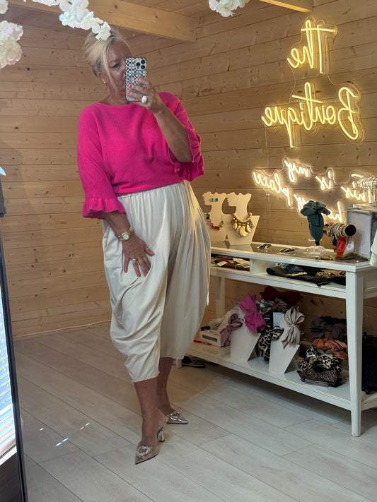 Hot pink Talia ladies relaxed fit jumper with fluted ruffle cuffs